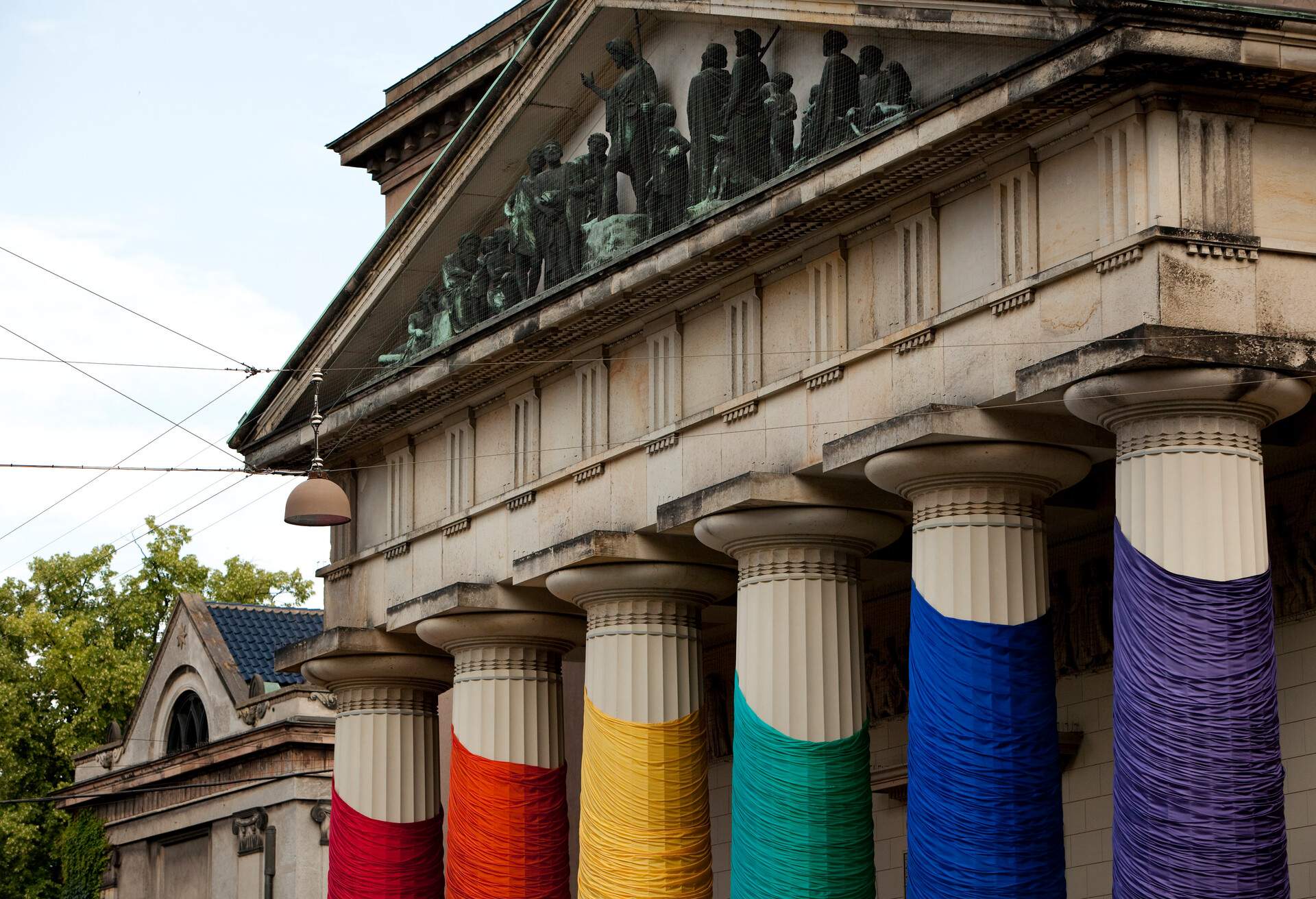Pillars of Our Lady Church wrapped in fabric in the Gay colors