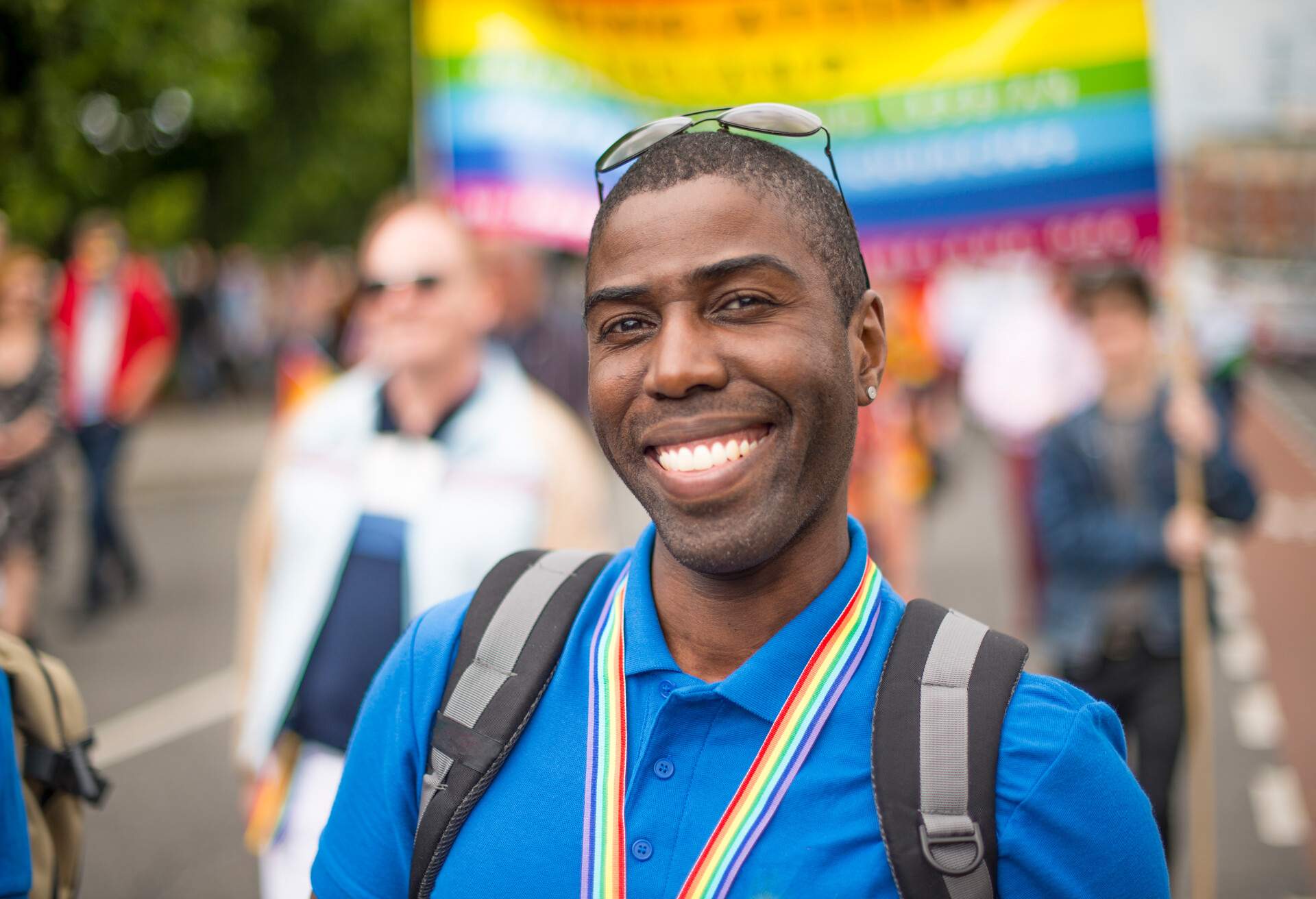 Smiling handsome gay man during Gay Pride Parade, Dublin, Ireland