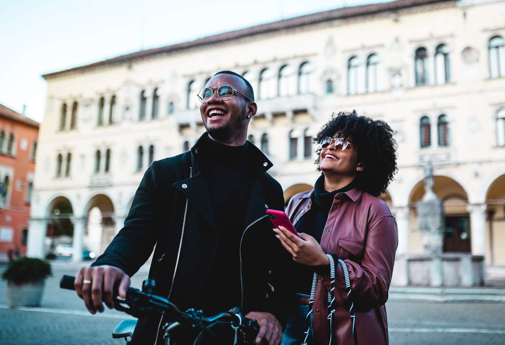 people couple friends city bicycle bike mobile device travel