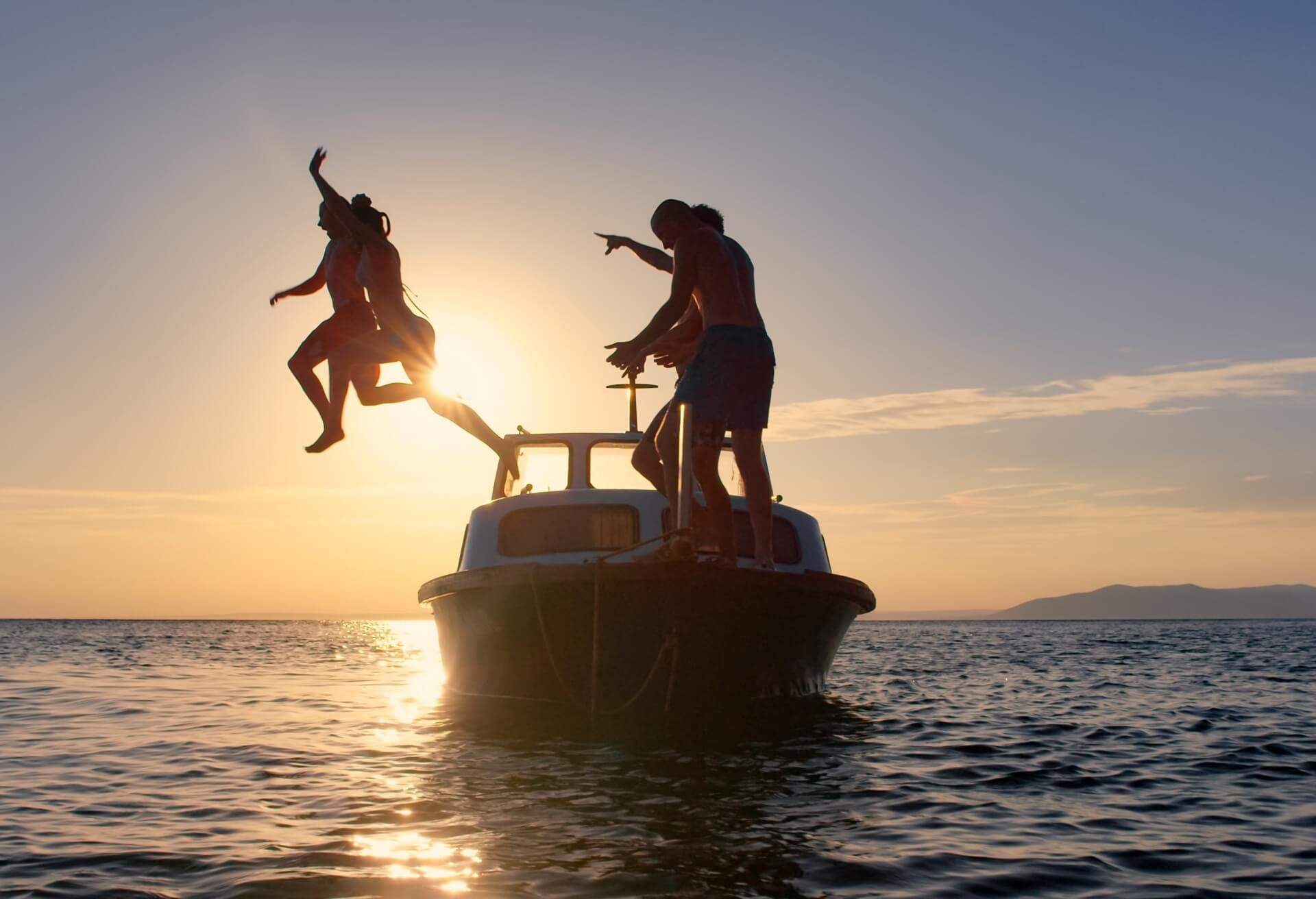 dest_croatia_theme_people_diving-into-the-water_gettyimages-686947588