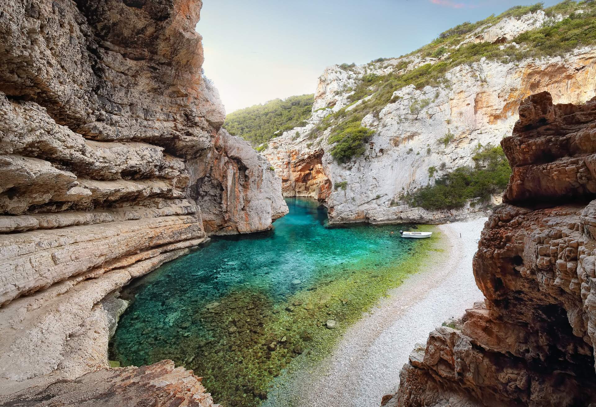 DEST_CROATIA_VIS_ISLAND_Stiniva_BEACH_GettyImages-1325217918