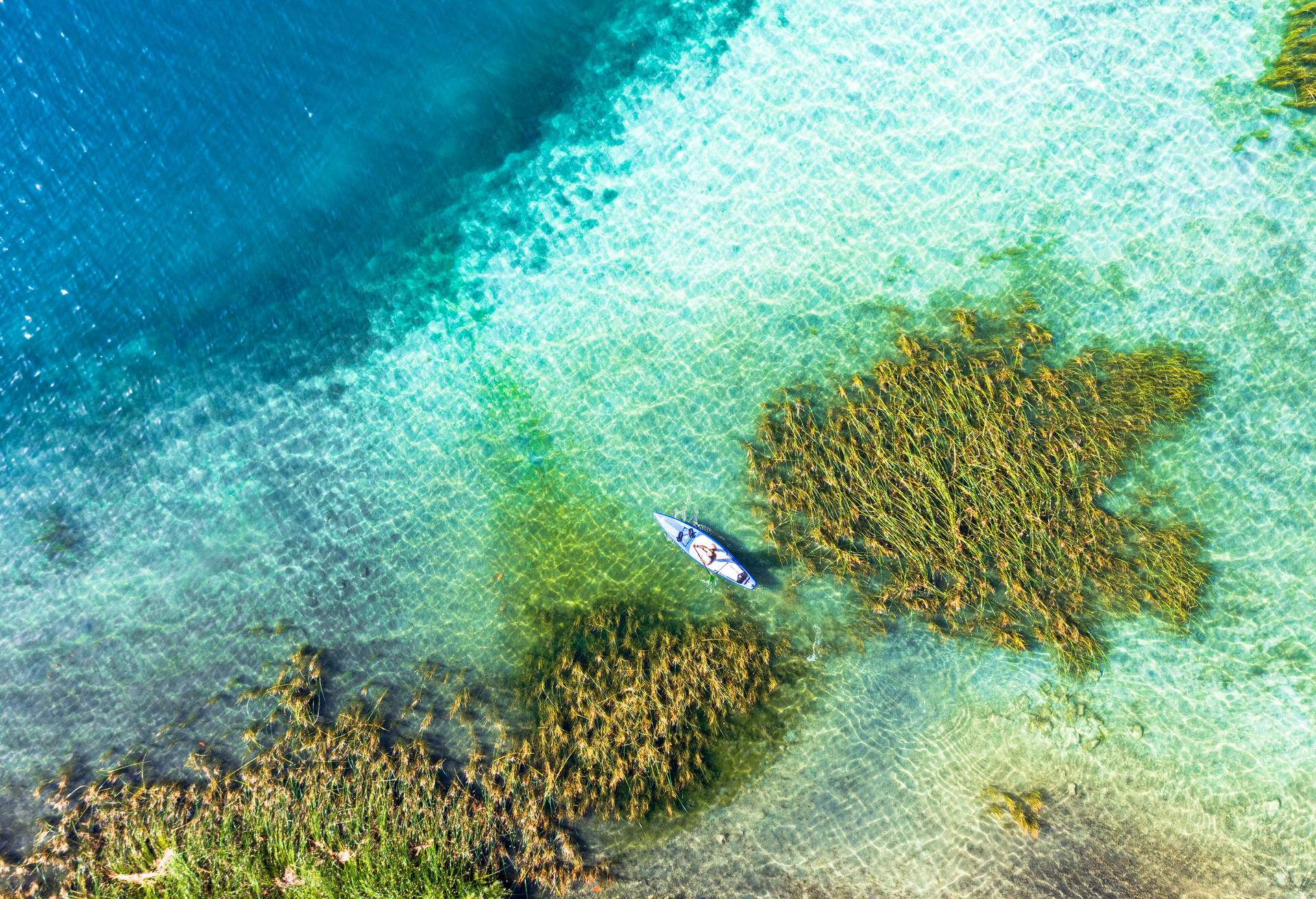 DEST_GREECE_AERIAL_OCEAN_REEF_PEOPLE-GettyImages-1338746761