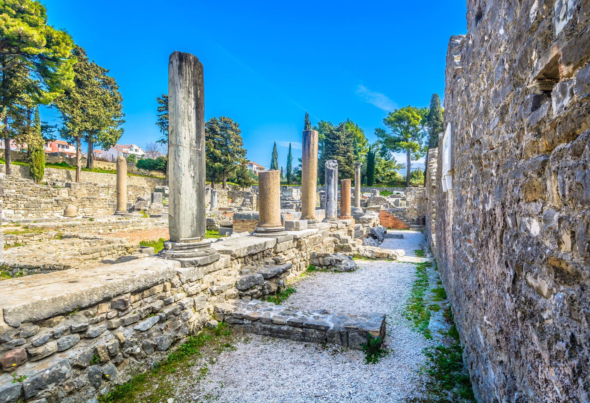 Scenic view at old outdoors public ruins of ancient roman city Salona in suburb of town Split, Croatia.