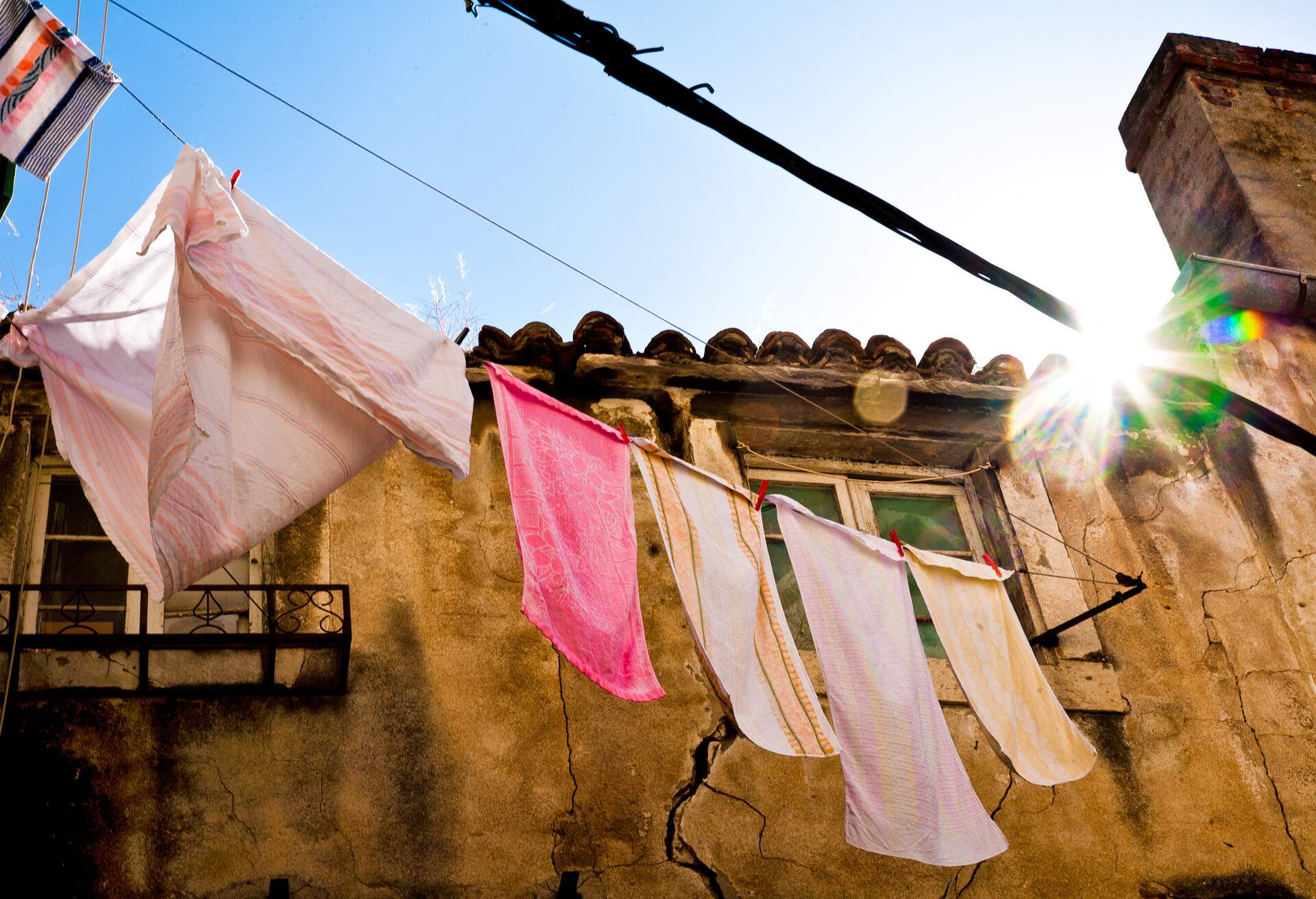 Residents in the old Palace of Diocletian in Split hang their washing over the streets to dry, painting the old palace in a wash of color.