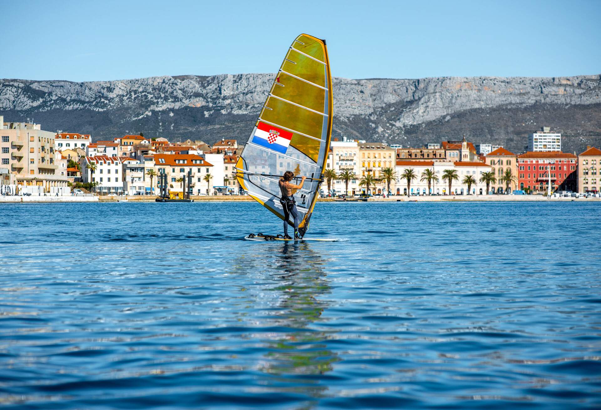 City Split coastline view from the sea with the windsurfer in Croatia; Shutterstock ID 259365494