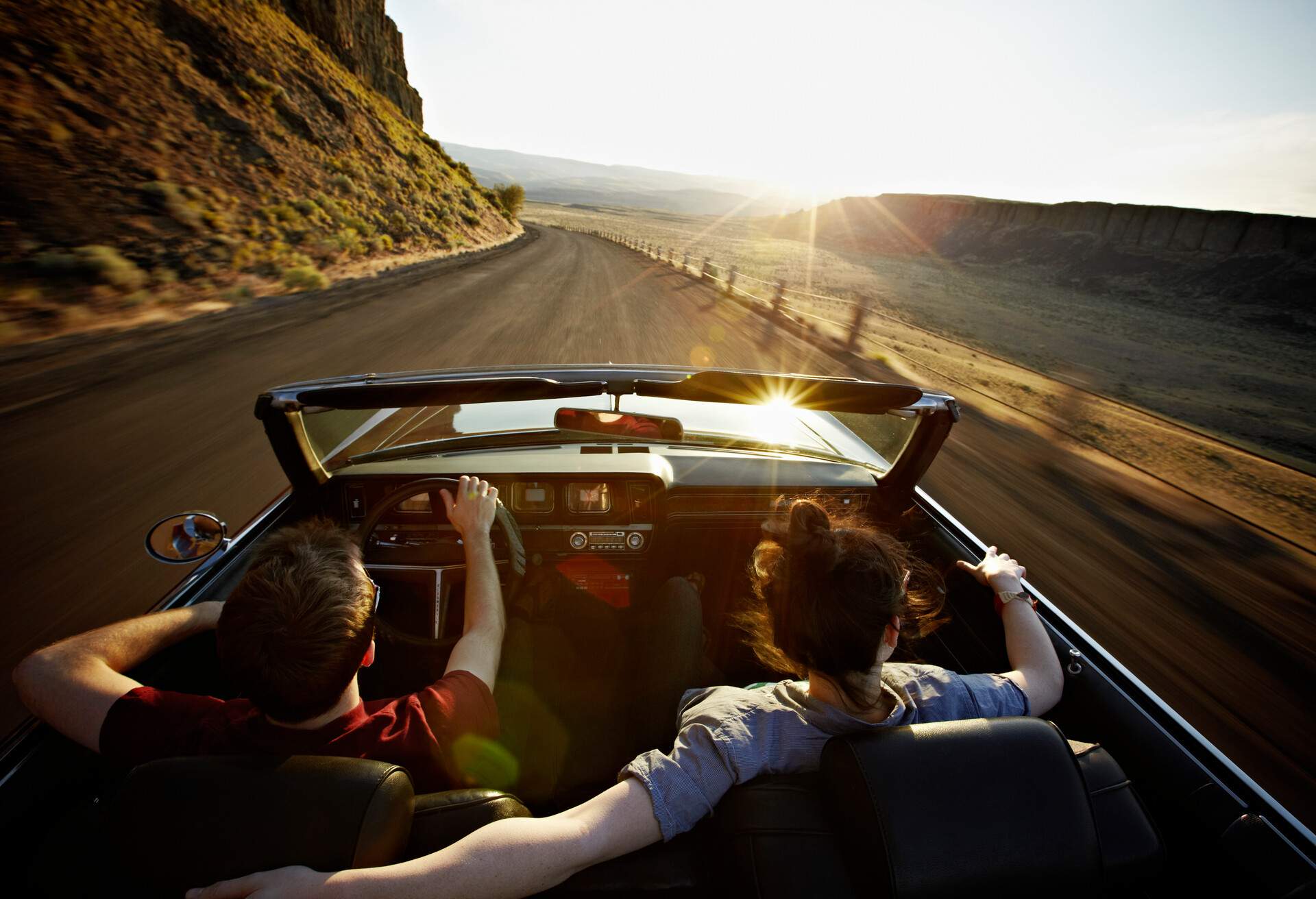 THEME_PEOPLE_CAR_ROADTRIP_CONVERTIBLE_GettyImages-104566861
