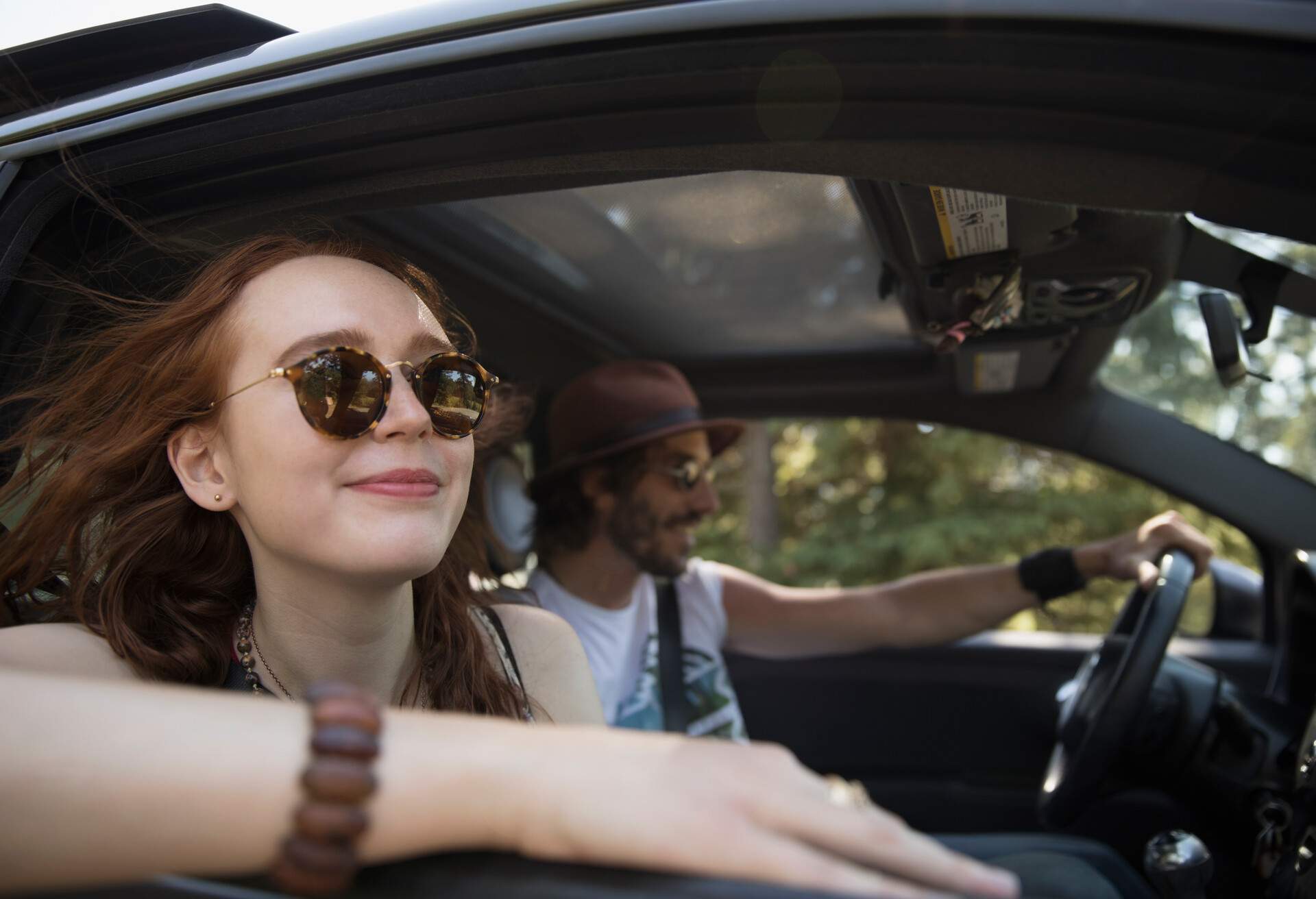 THEME_CAR_DRIVING_COUPLE_GettyImages-753290697_Universal