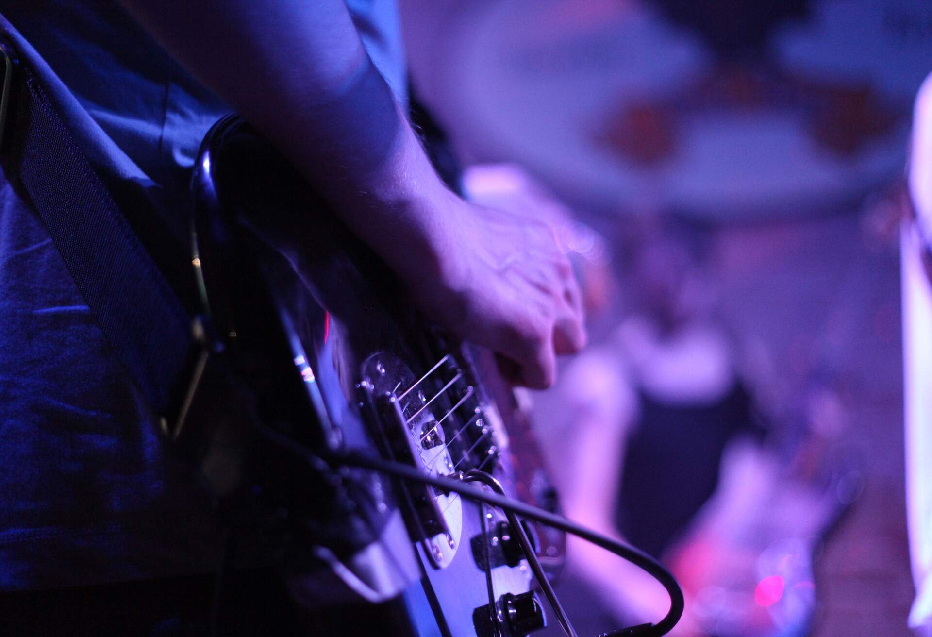 Man playing guitar.