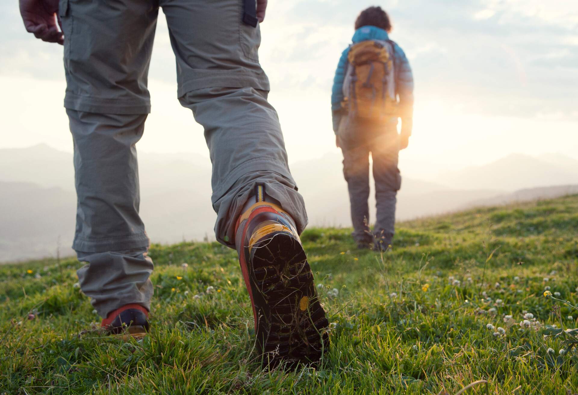 DEST_AUSTRIA_UNTERBERGHORN_PEOPLE_HIKE_SUNRISE_GettyImages-588497647-1.jpg