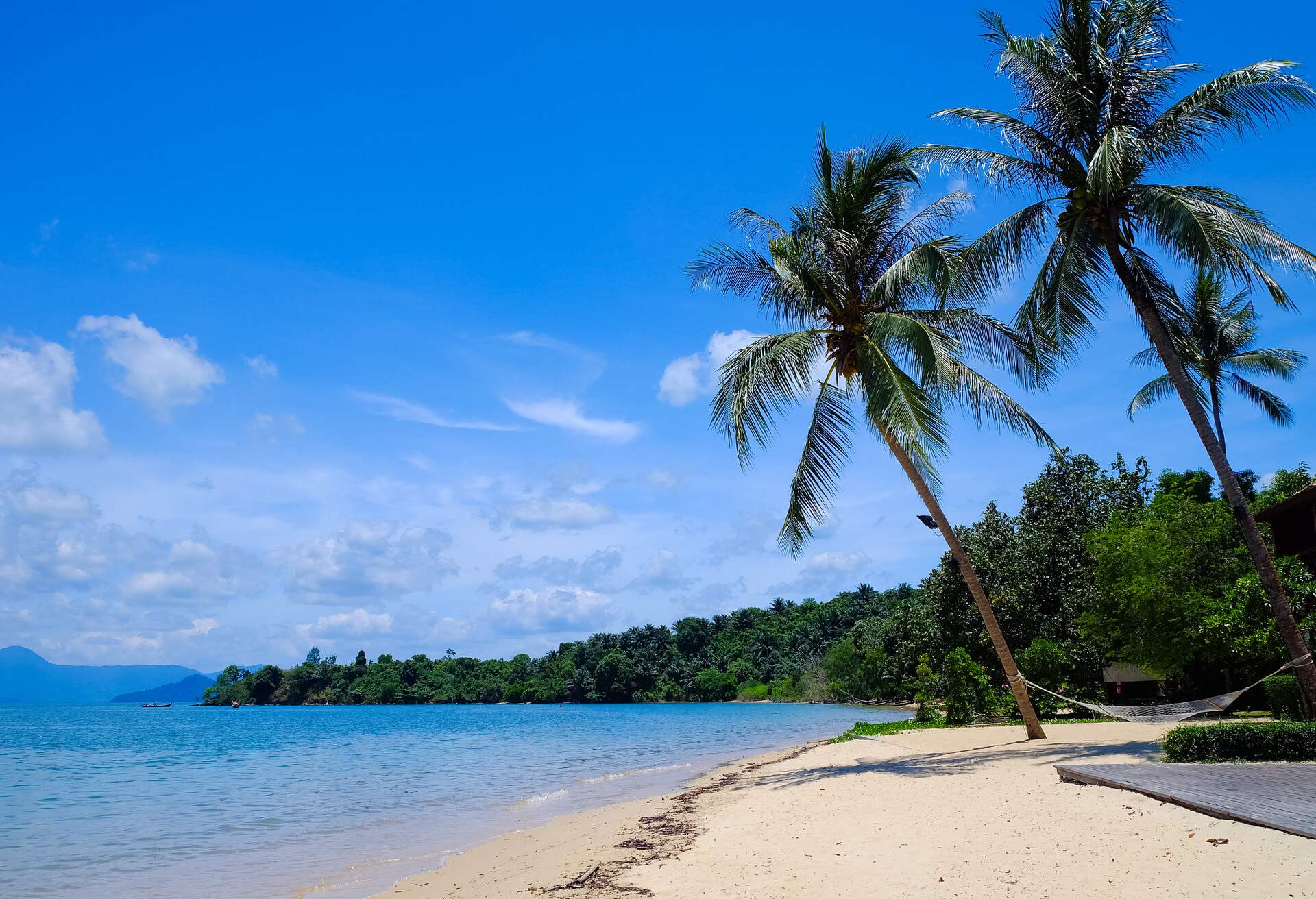 Tropical beach seaside and blue sky at Koh Phayam Island Thailand; Shutterstock ID 631403099