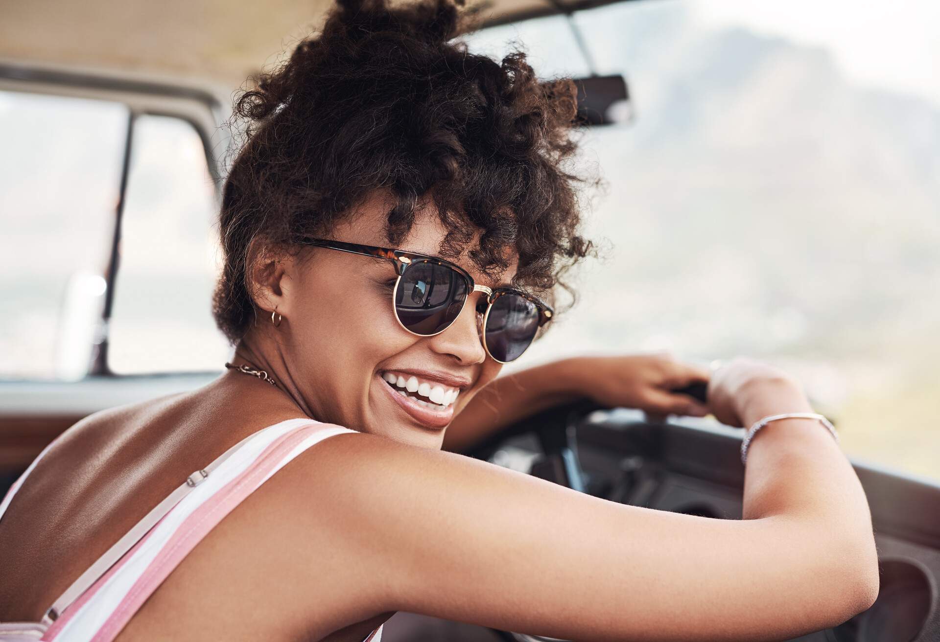 THEME_PEOPLE_WOMAN_DRIVING_VAN_ROADTRIP_GettyImages-1191662733