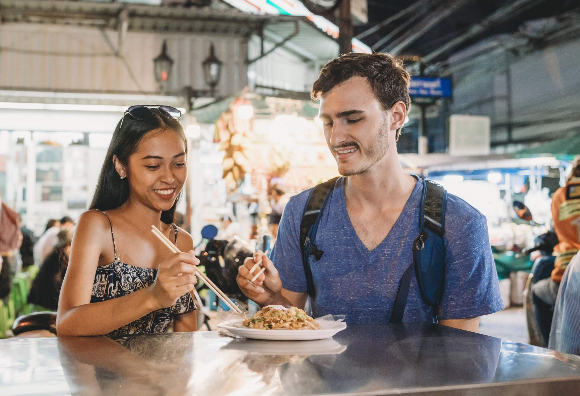 dest_thailand_bangkok_theme_people_couple_night-market_gettyimages-1132933215_universal_within-usage-period_86544