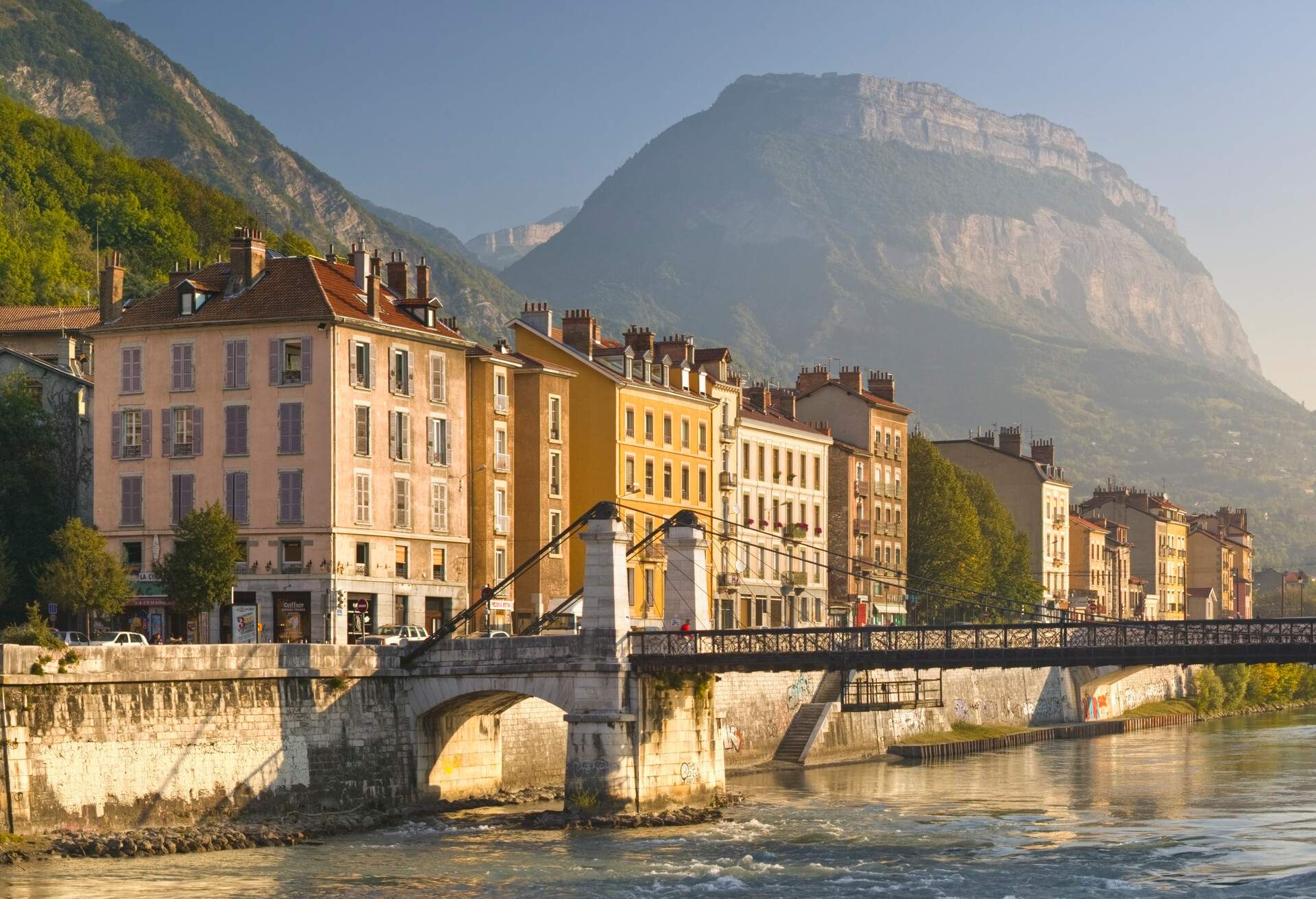 View along the River Isere with Pont St.-Laurent in the foreground.