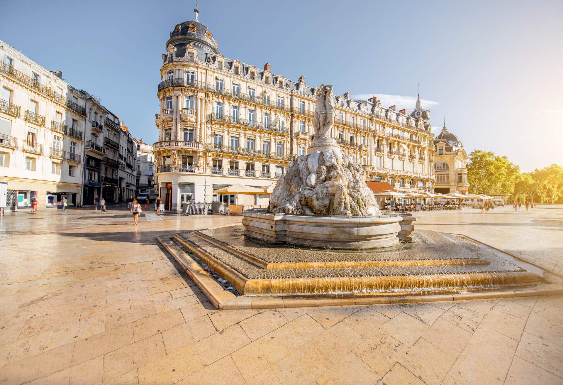 View on the Comedy square with fountain of Three Graces during the morning light in Montpellier city in southern France