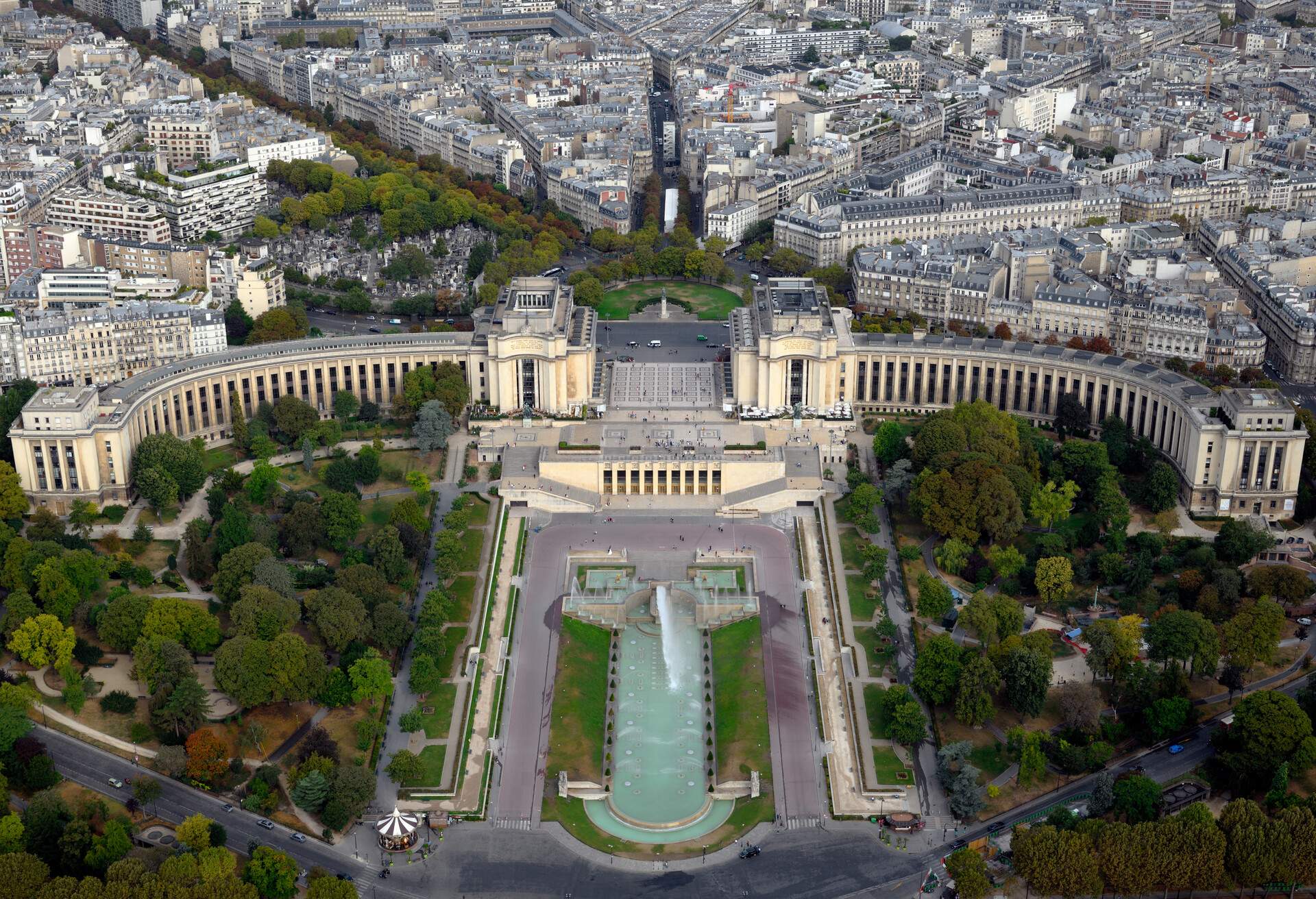 Photograph taken at an altitude of Three hundred and fourteen metres on a summer morning in August,  having travellede on the East wing lift up to the highest viewing platform on La Tour Eiffel located at Champ de Mars, 5 Avenue Anatole France, 75007 in Paris, France. Here we look over part of Paris including the fountains in Jardins du Trocadero towards Place  du Trocadero and Esplanade du Trocadero in Paris, France...The Eiffel Tower was originally designed by Gustave Eiffel and constructed between 1887-1889 as the entrance to the worlds fair in that year. It is now the worlds most visited paid monument, standing 324 metres tall (1,063ft) with three floors and eight lifts and was the tallest building in the world from 1889 to 1930.