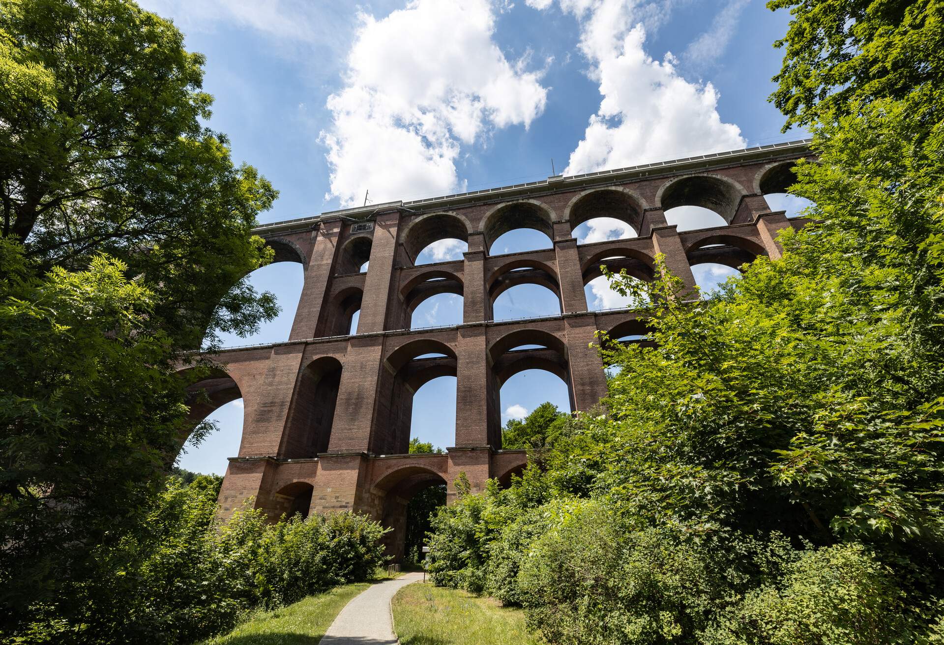 The Göltzsch Viaduct (German: Göltzschtalbrücke) is a railway bridge in Saxony/ Germany, built between 1846 and 1851. It is the largest brick-built bridge in the world (2.5 Million bricks). It spans the valley of the Göltzsch River between Mylau and Netzschkau, around 4 kilometres (2.5 mi) west of Reichenbach im Vogtland in the German Free State of Saxony...The bridge is infamous as a suicide bridge, because many people have taken their lives by plunging off the bridge in the last 150 years.