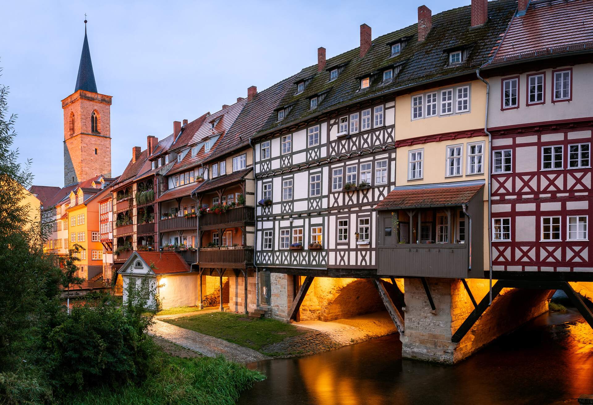 Krämerbrücke Erfurt, Erfurt, Germany..The Krämerbrücke is a medieval arch bridge lined with half timbered shops and houses on both sides of a cobblestone street. It is one of the few remaining bridges in the world that have inhabited buildings.