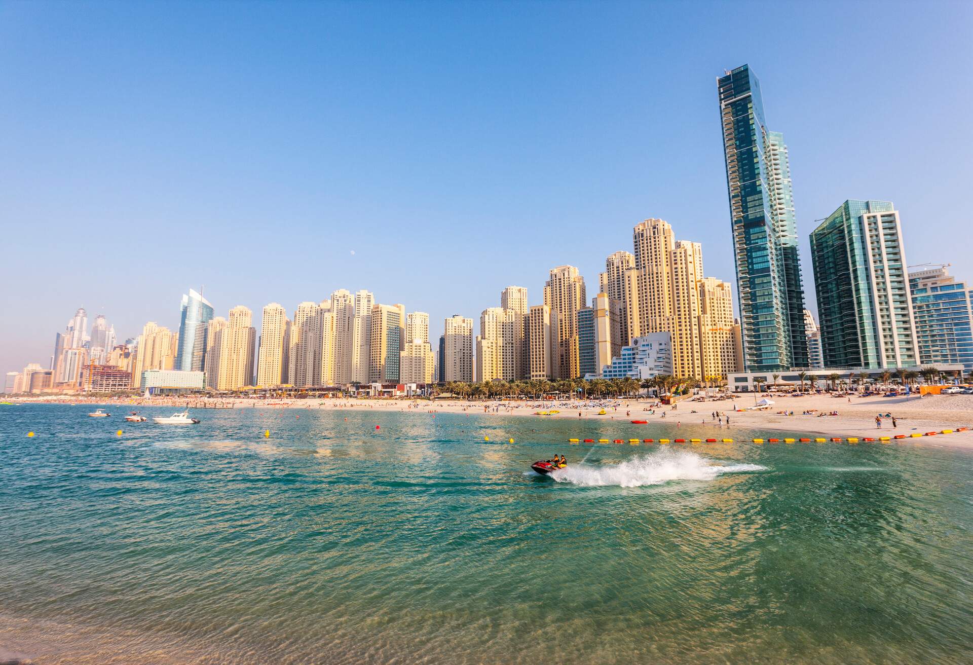 View to Dubai JBR beach and modern buildings in Dubai Marina district