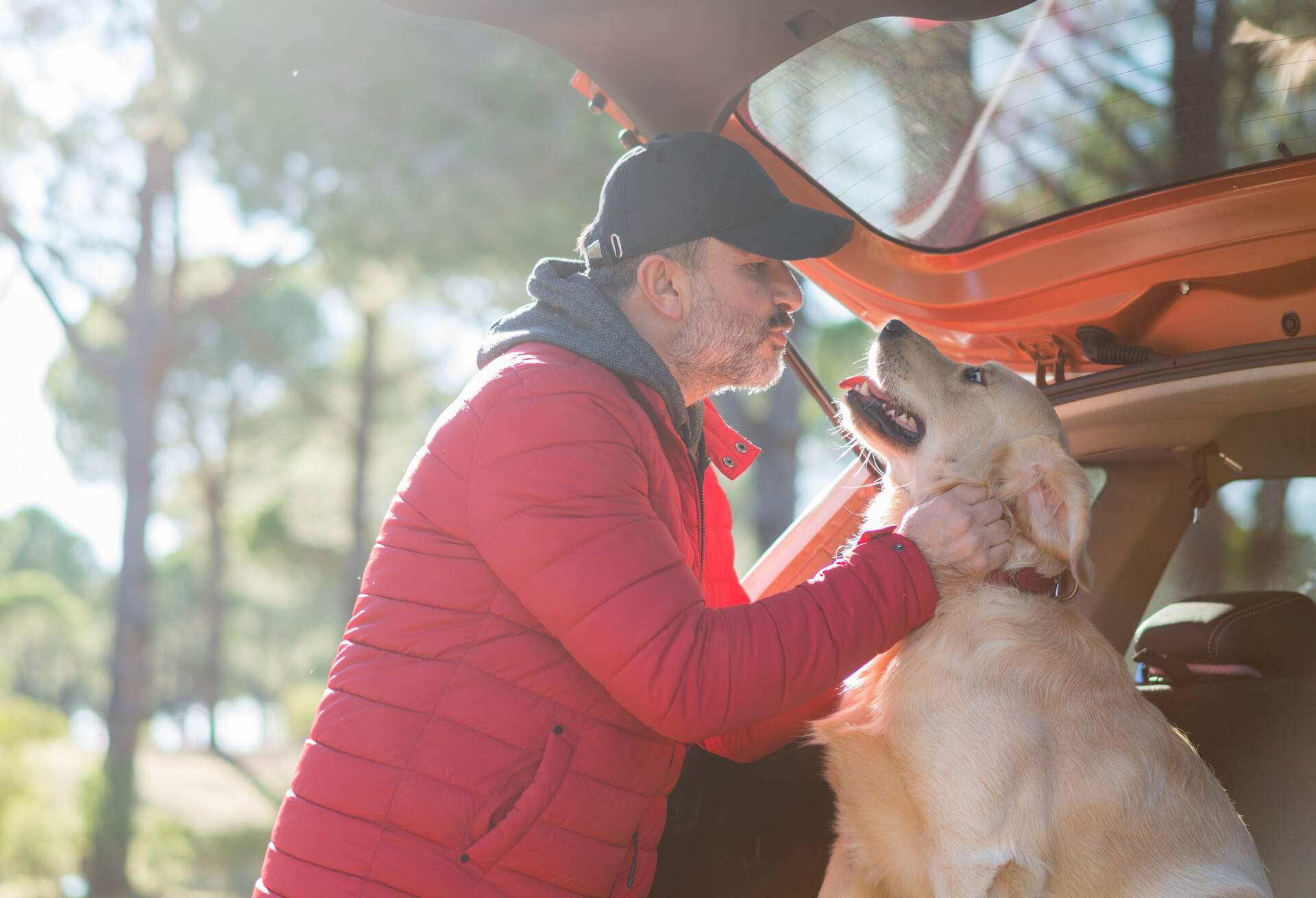 Man playing with his dog