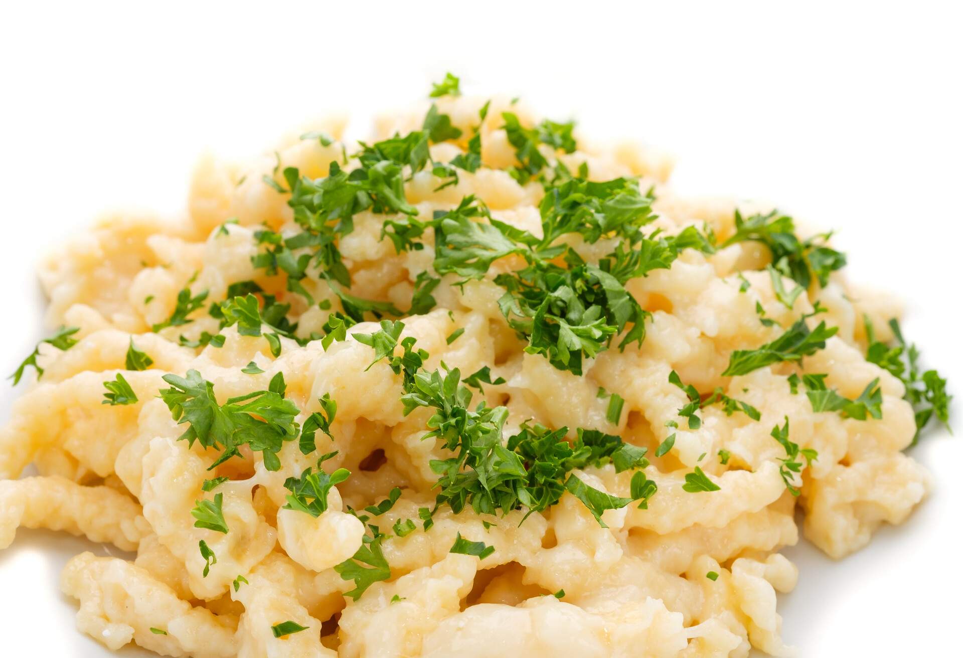 German speciality Käsespätzle cheese noodles with gruyere and chives