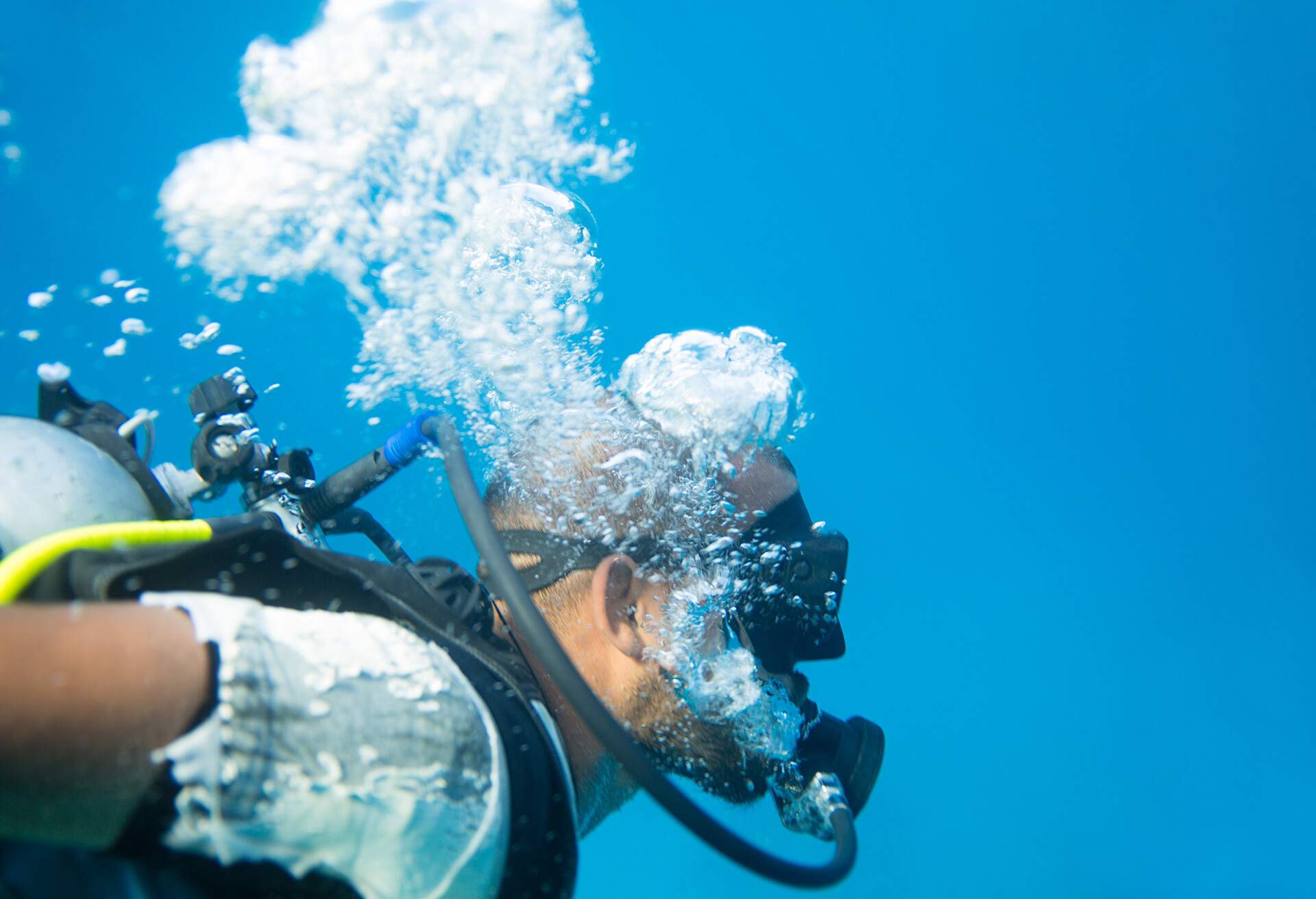 Portrait of bearded male in scuba diving mask. Red sea