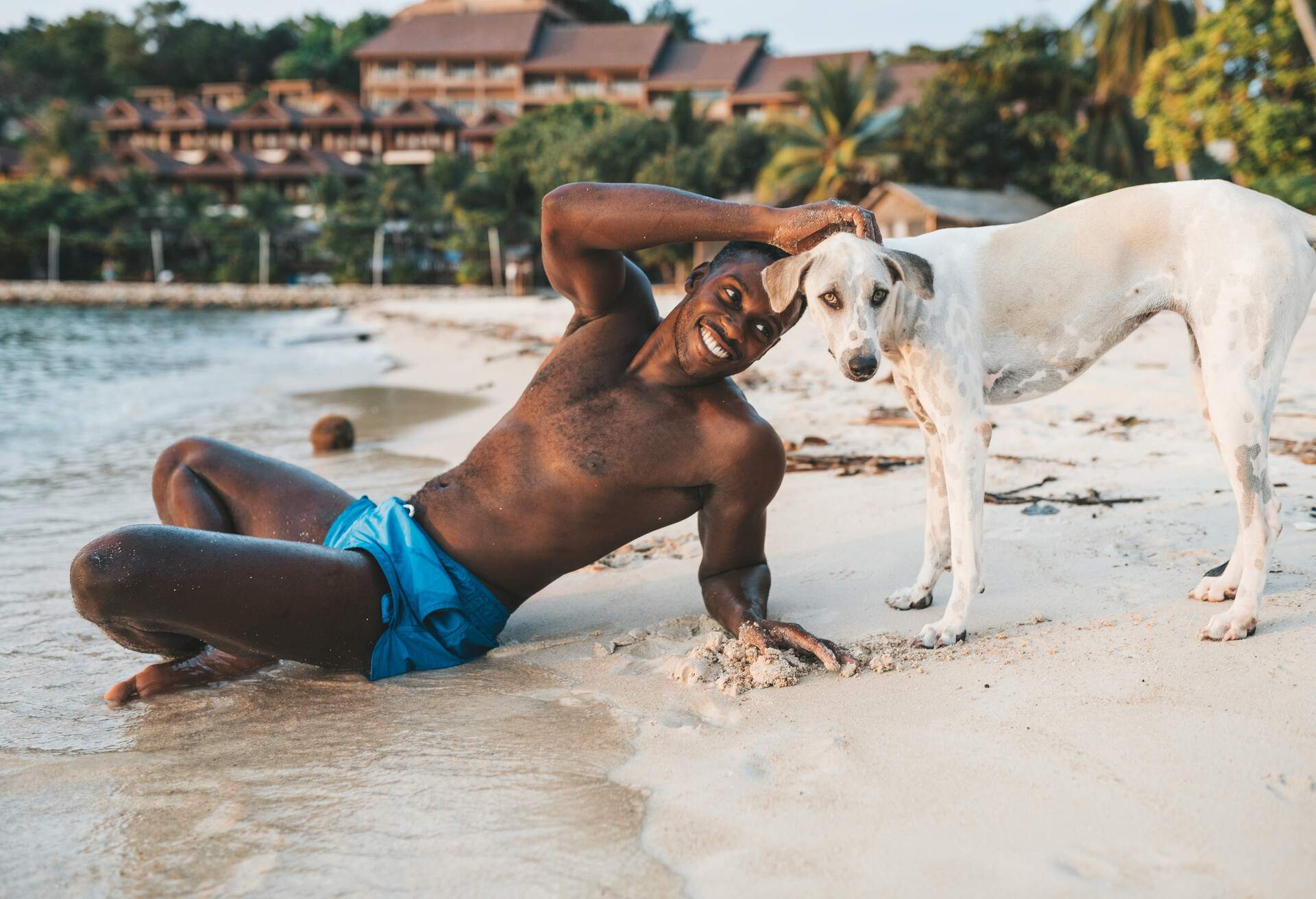 THEME_PETS_DOG_BEACH_PEOPLE_GettyImages-1283030040