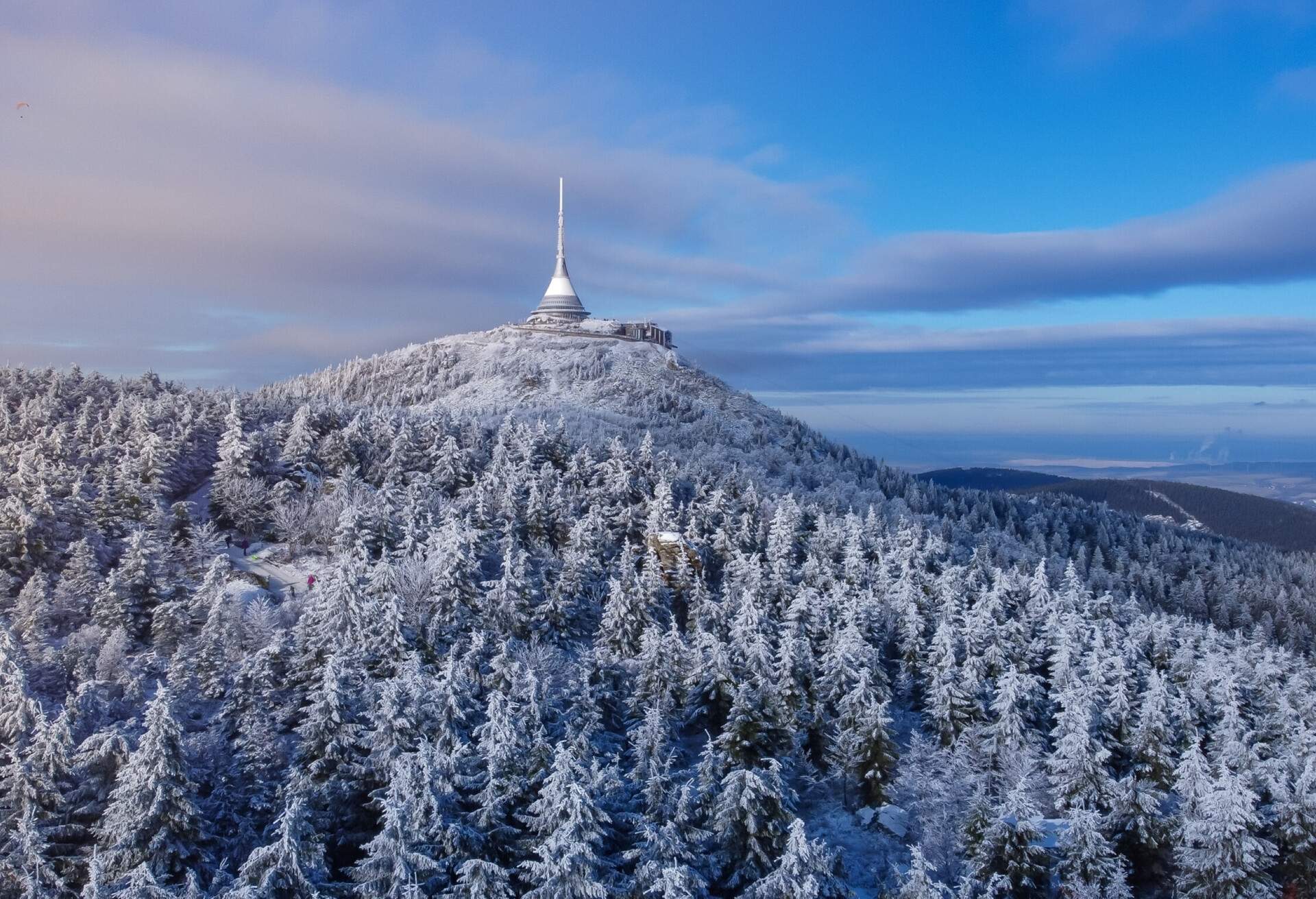 Ještěd photographed from a drone in cold winter