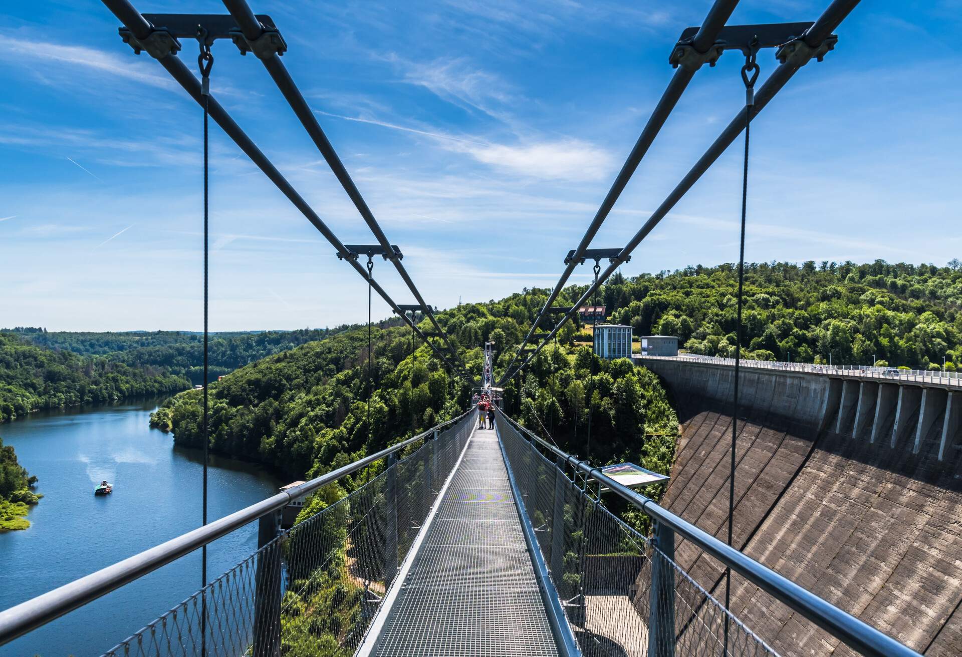 Titan RT rope suspension bridge over the Rappbodetalsperre (rappbode dam) in the Harz Mountains in Germany. In 2017, it held the record as longest suspension bridge of this type in the world.