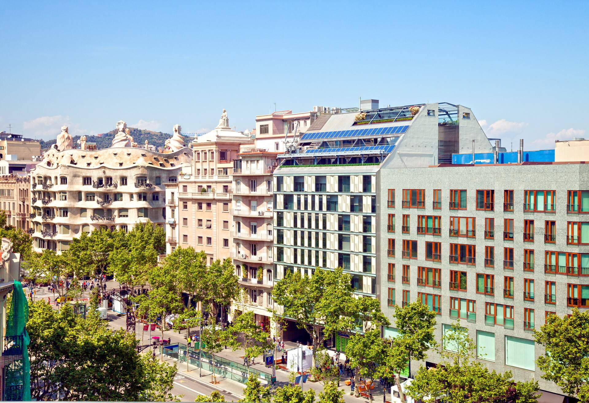 View of passeig de Gracia, the shopping street in Barcelona. Casa Mila (or La Pedrera), of Gaudi included.