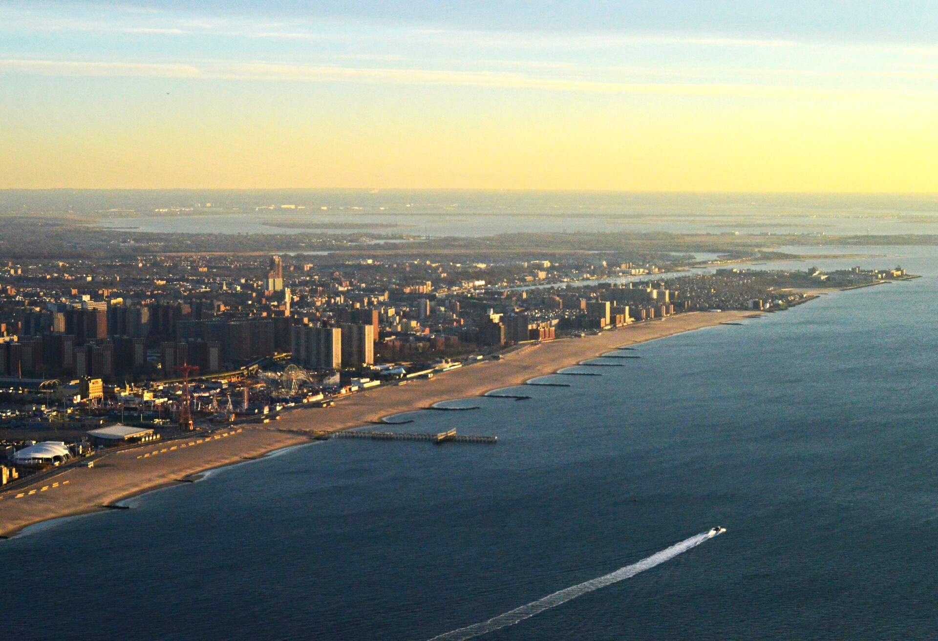 This is an aerial photo of Coney Island and Brighton Beach with Jamaica Bay in the background, in New York City