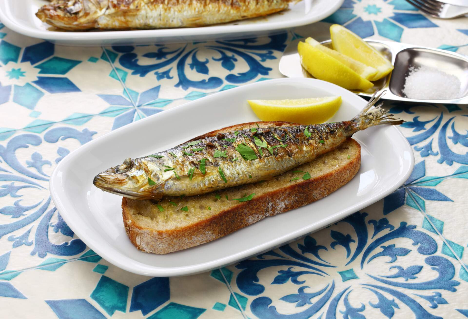 sardinhas assadas, portuguese grilled sardine on toasted bread
