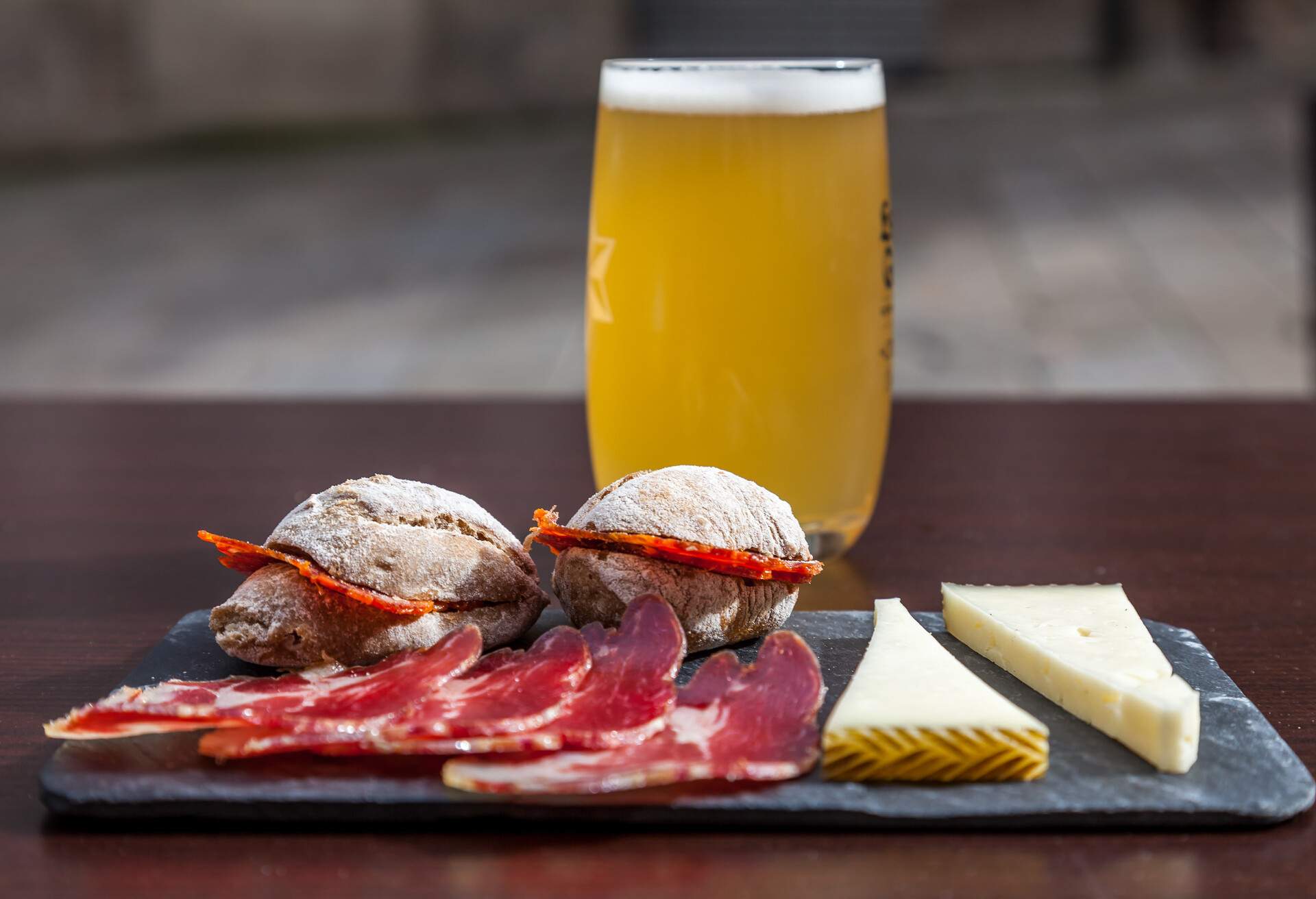 Tapas and beer served on a slate, Santiago de Compostela, A Coruna, Galicia, Spain