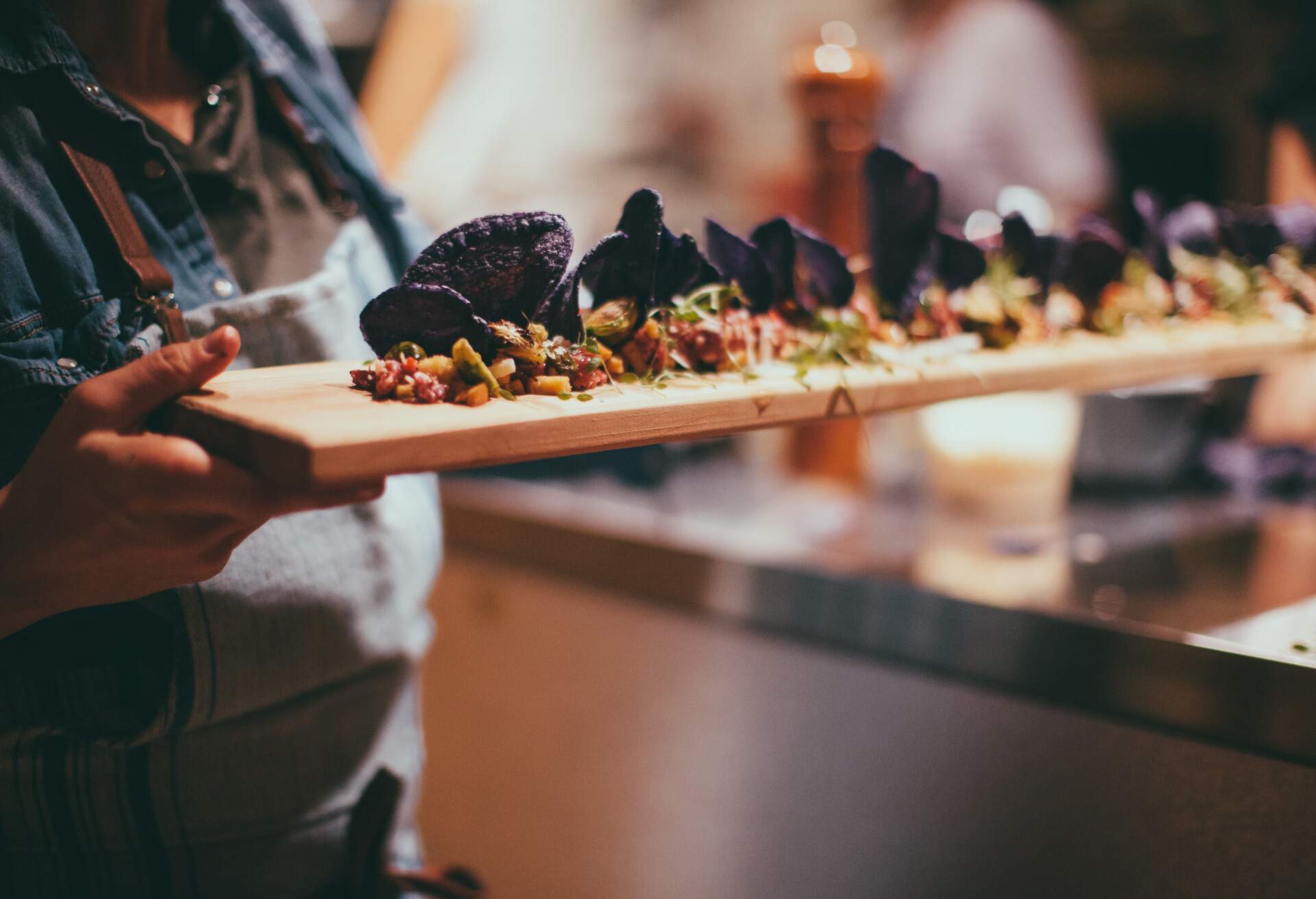 Caterer preparing food. Food and drink establishment.