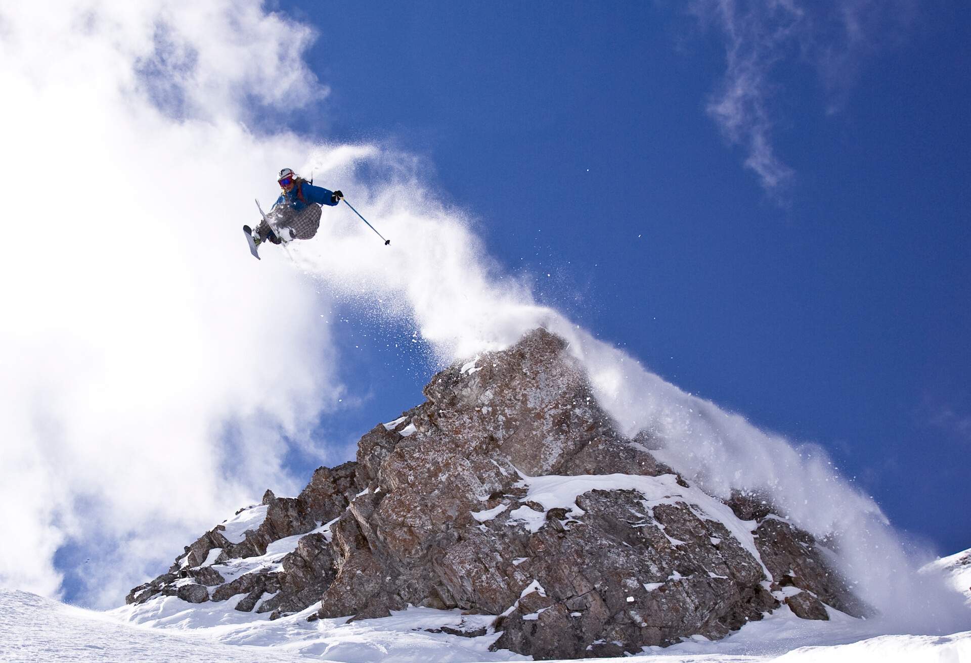 Young man (Dave Treadway) catches huge air while skiing at Island Lake Resort (a snowcat skiing operation), Fernie, BC, Canada.