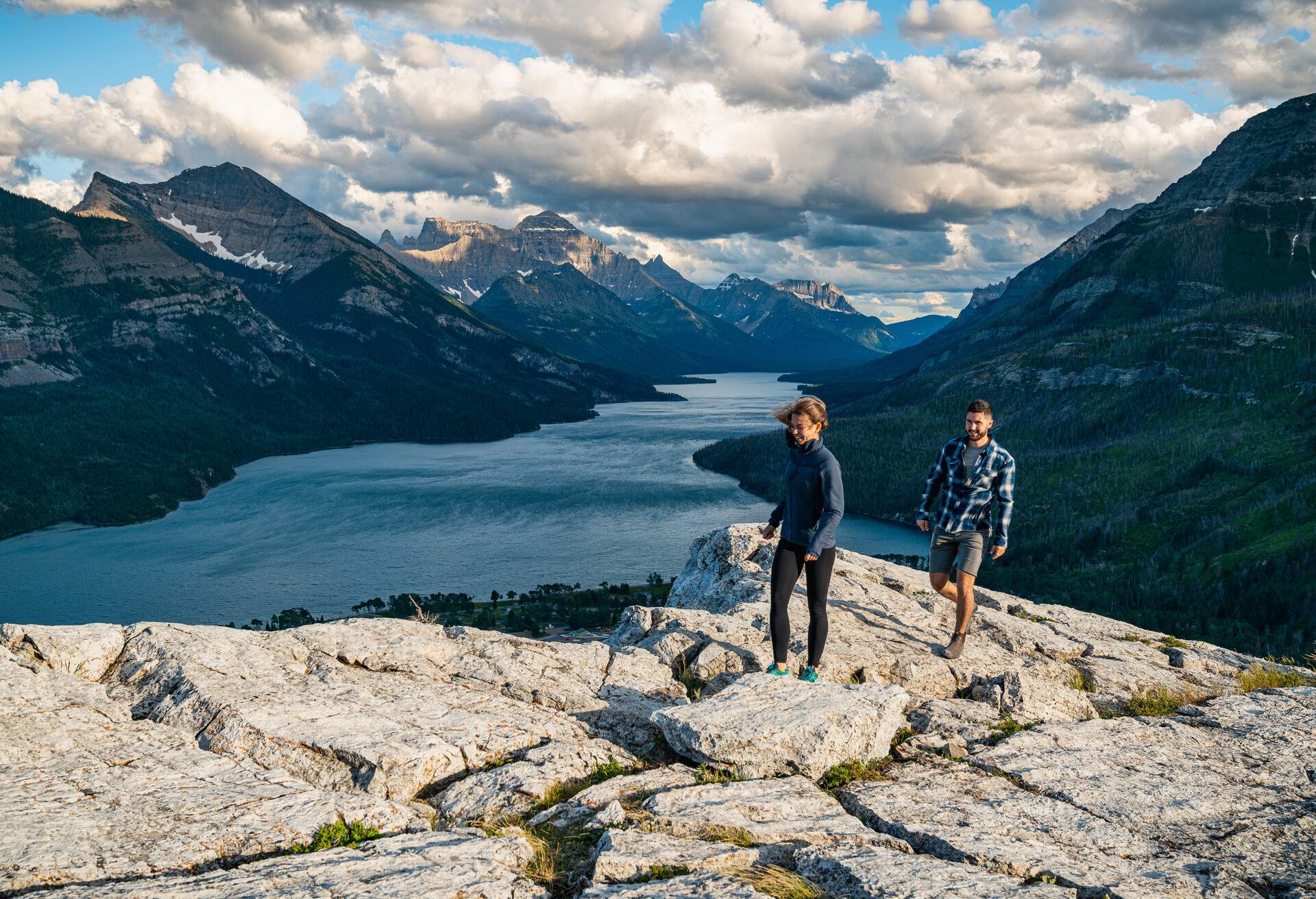 DEST_CANADA_WATERTON_LAKES_NATIONAL_PARK_MOUNTAIN_PEOPLE_COUPLE_HIKING_GettyImages-1281853262