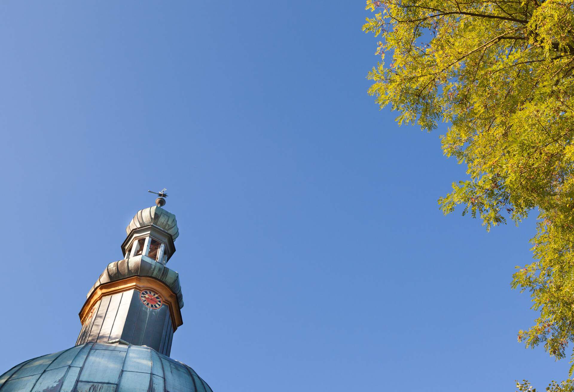 Baroque chapel Mariabrunn in bright morning light, district of Dachau near Röhrmoos, Bavaria, Germany. 