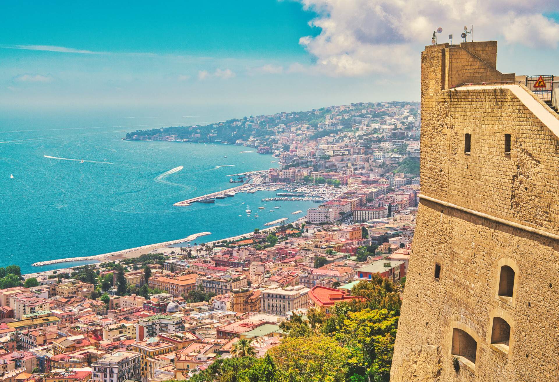 Looking down from the famous Castel Sant'Elmo to the Gulf of Naples..Naples, is the regional capital of Campania and the third-largest city of Italy, after Rome and Milan, with a population of almost 1million. It's the second-most populous metropolitan area in Italy and the 7th-most populous urban area in the European Union. In 1995, the historic center of Naples was listed by UNESCO as a World Heritage Site.