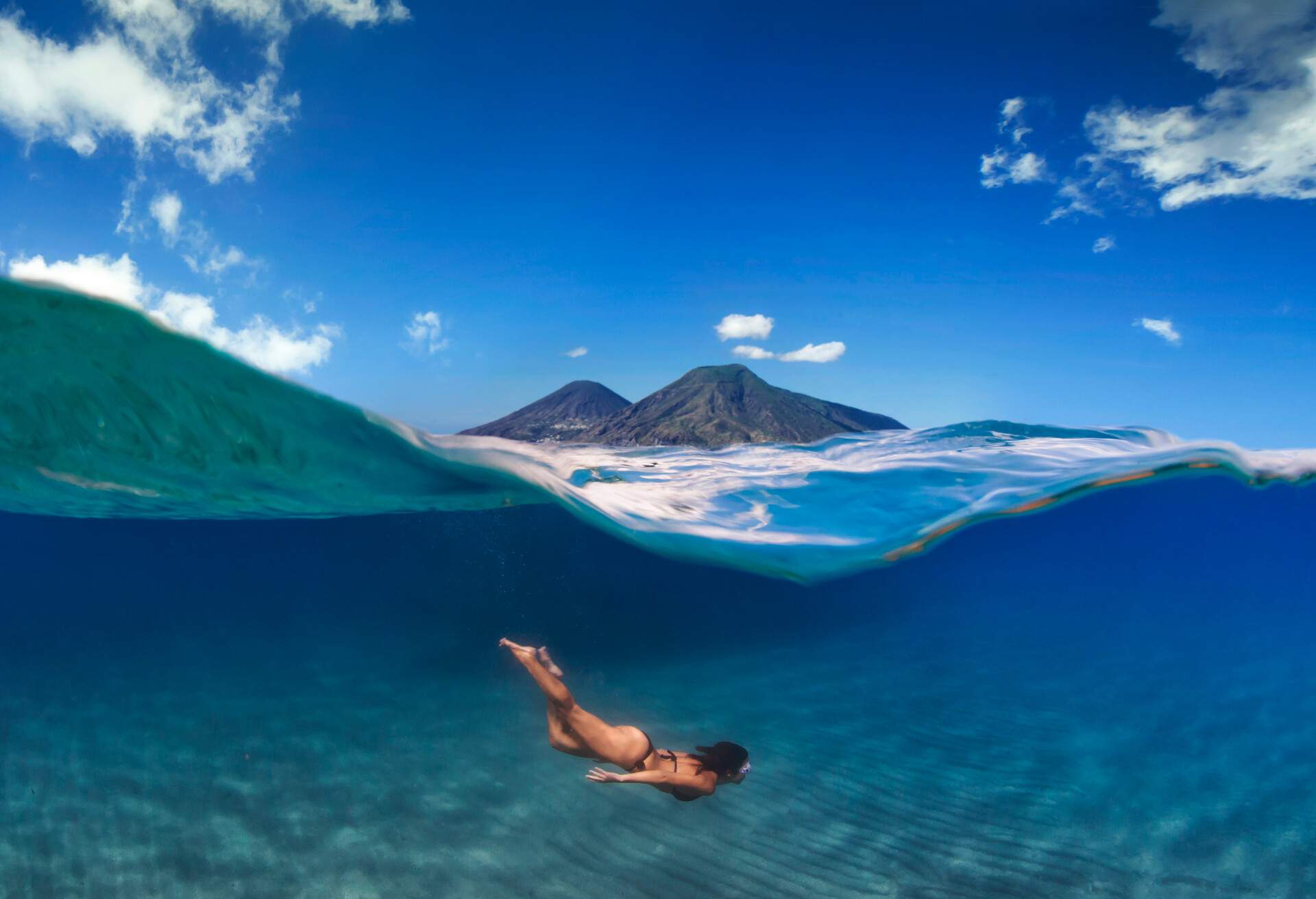 DEST_ITALY_SICILY_AEOLIAN-ISLANDS_SALINA_THEME_SNORKELLING-VOLCANO_GettyImages-1173139047