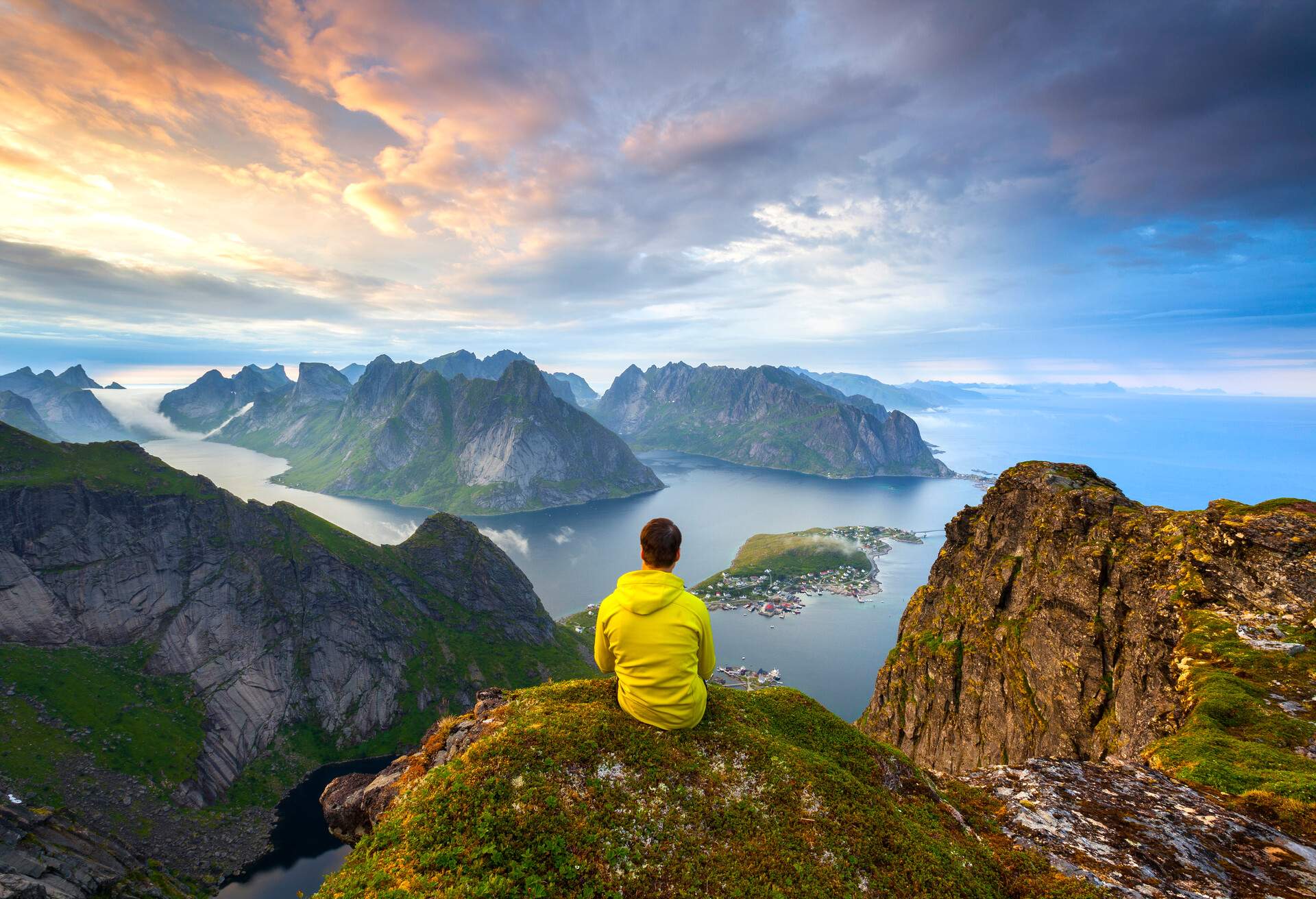 A man is watching to Sunset, Lofoten, Norway