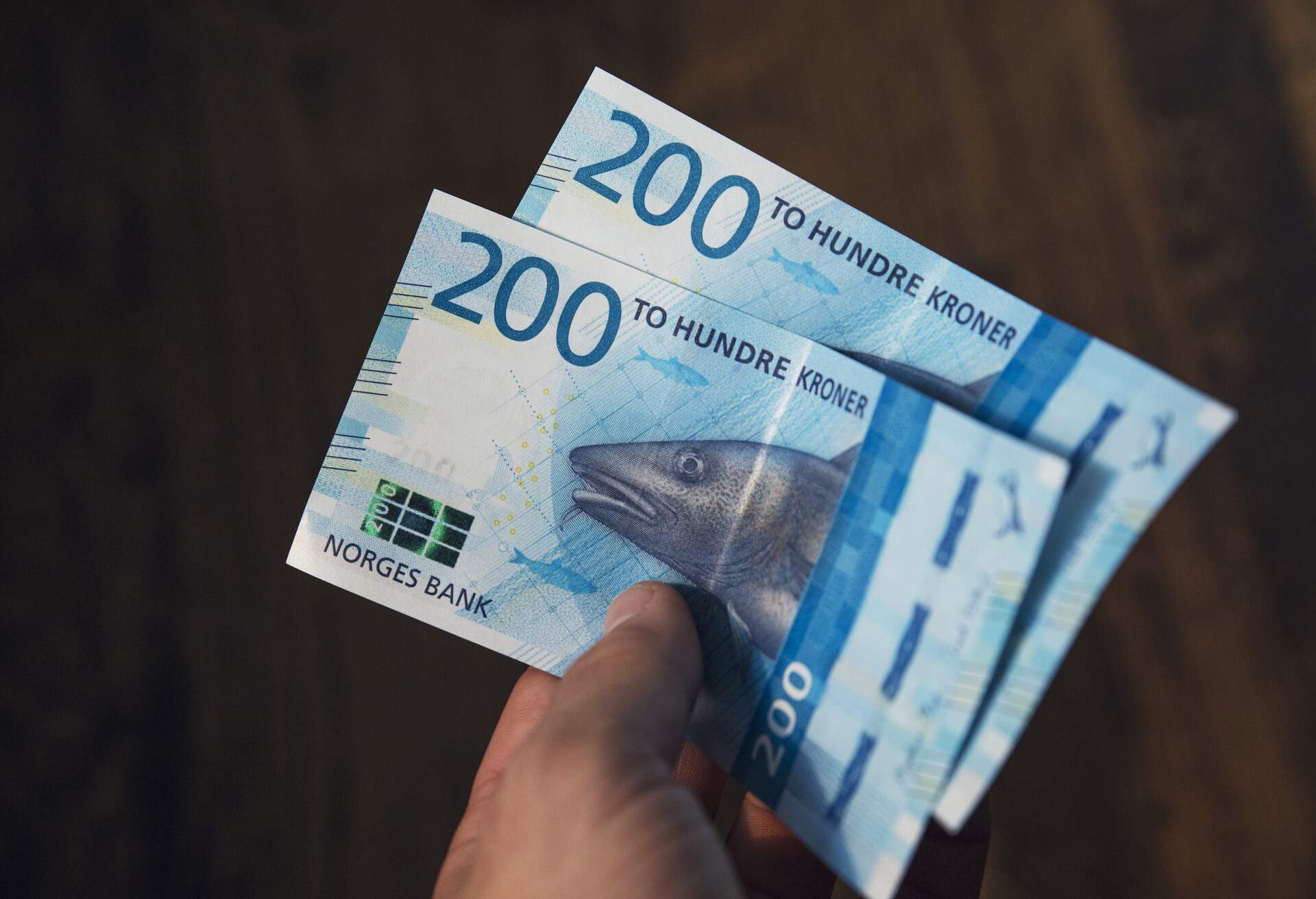 Two hundred denomination kroner banknotes sit in an arranged photograph in Oslo, Norway. Photographer: Kyrre Lien/Bloomberg