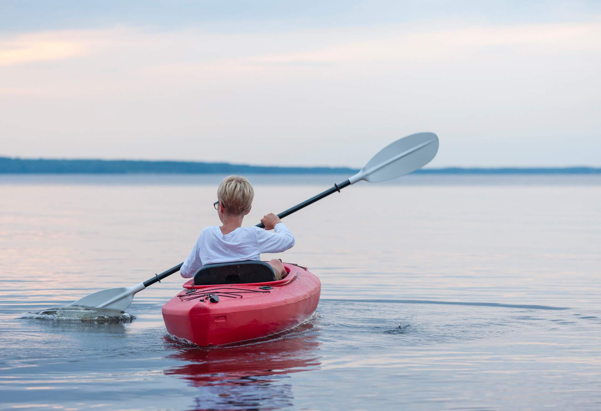 THEME_PEOPLE_KID_BOY_KAYAK_LAKE_GettyImages-548005107