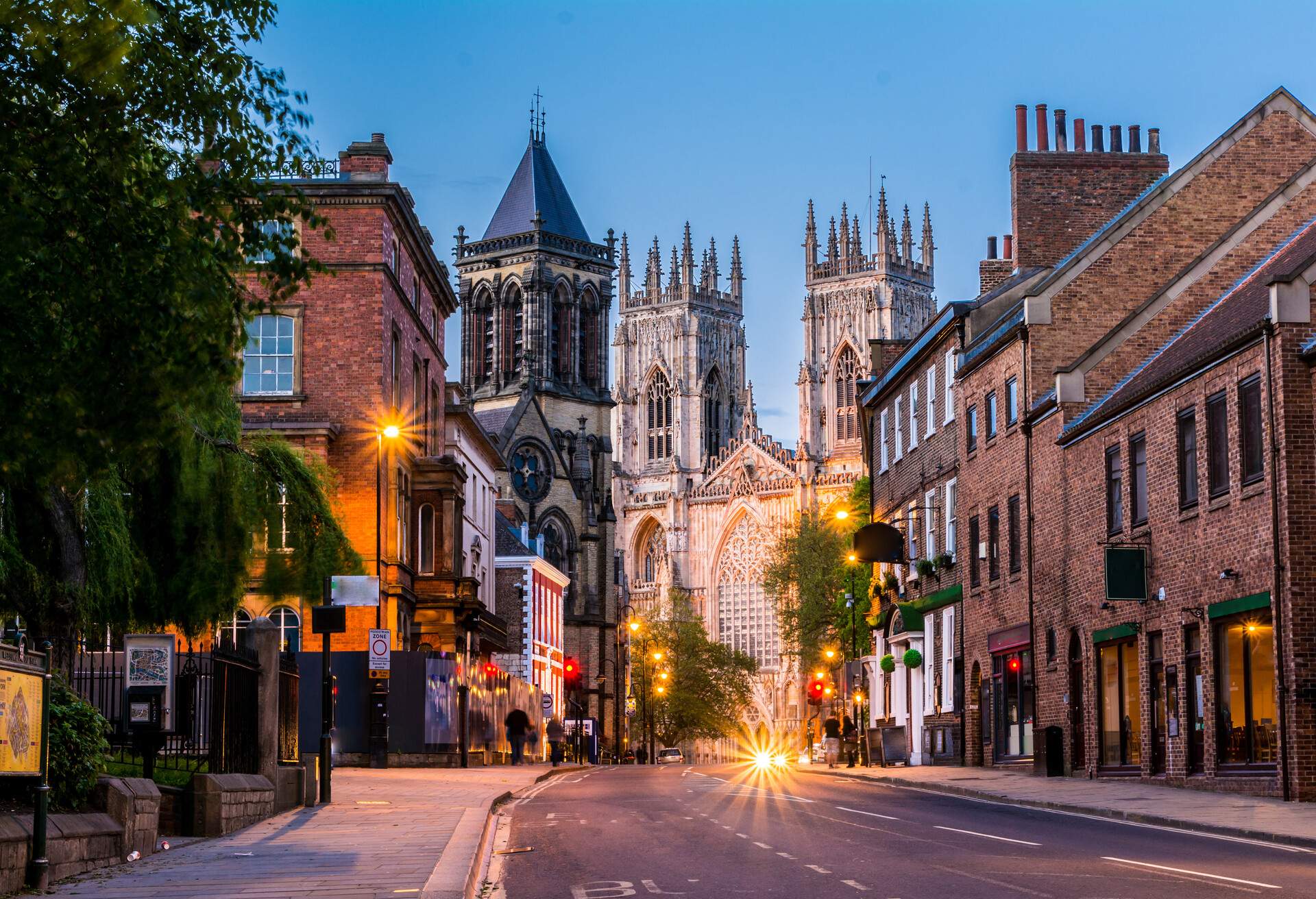 York, evening cityscape view from the street with York Minster in the background.