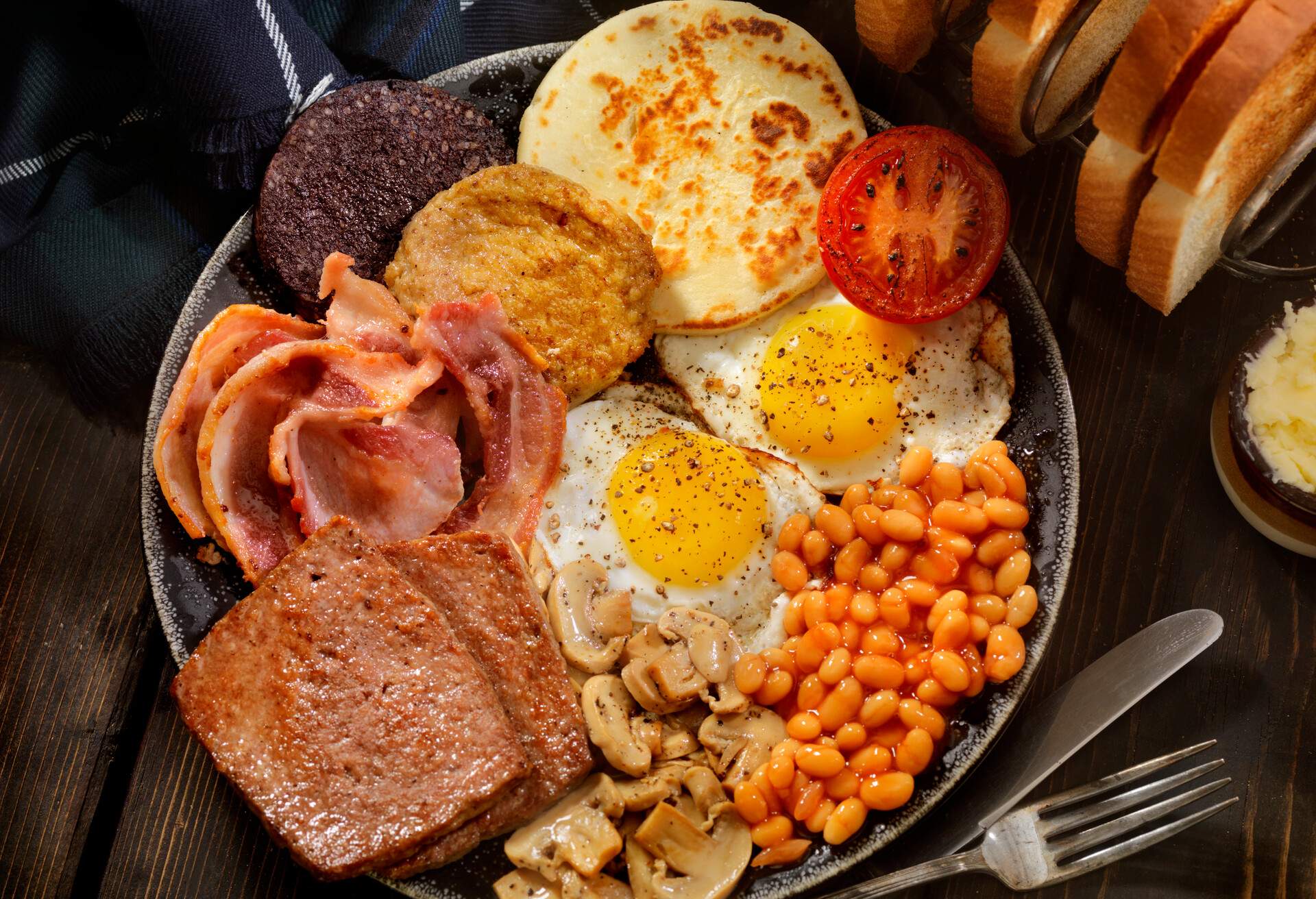 Sunny side up Eggs with Haggis,Blood Pudding, Sausage, Bacon, Beans, Mushrooms, Toast and Tomatoes-Photographed on Hasselblad H3D-39mb Camera