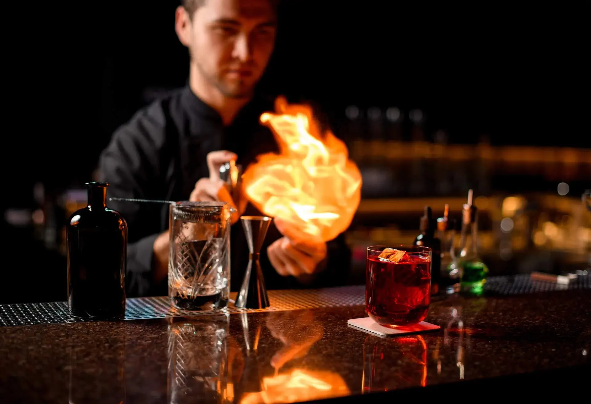 theme_people_bartender_making_cocktail_under_fire_shutterstock-portfolio_1600585828_universal_within-usage-period_75871