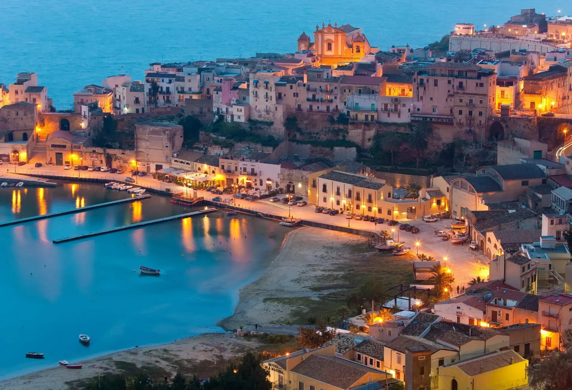 View of harbor at dusk, Castellammare del Golfo, Sicily, Italy
