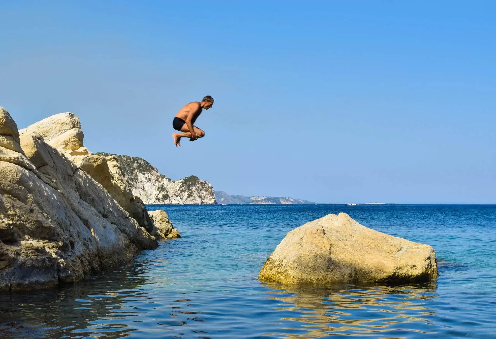 DEST_GREECE_CORFU_THEME_JUMP_GettyImages-958937146