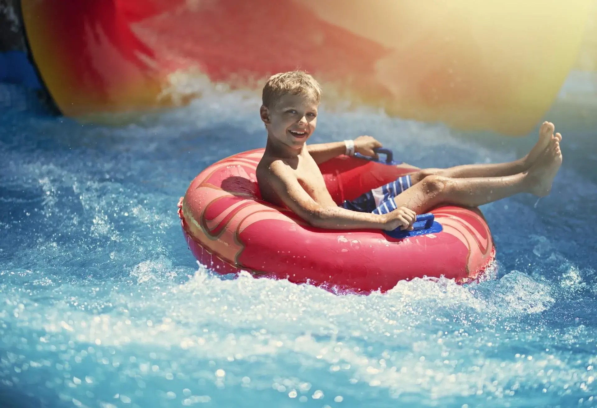 theme_people_children_amusement-park_waterpark_waterslide-gettyimages-1152169722_universal_within-usage-period_83206