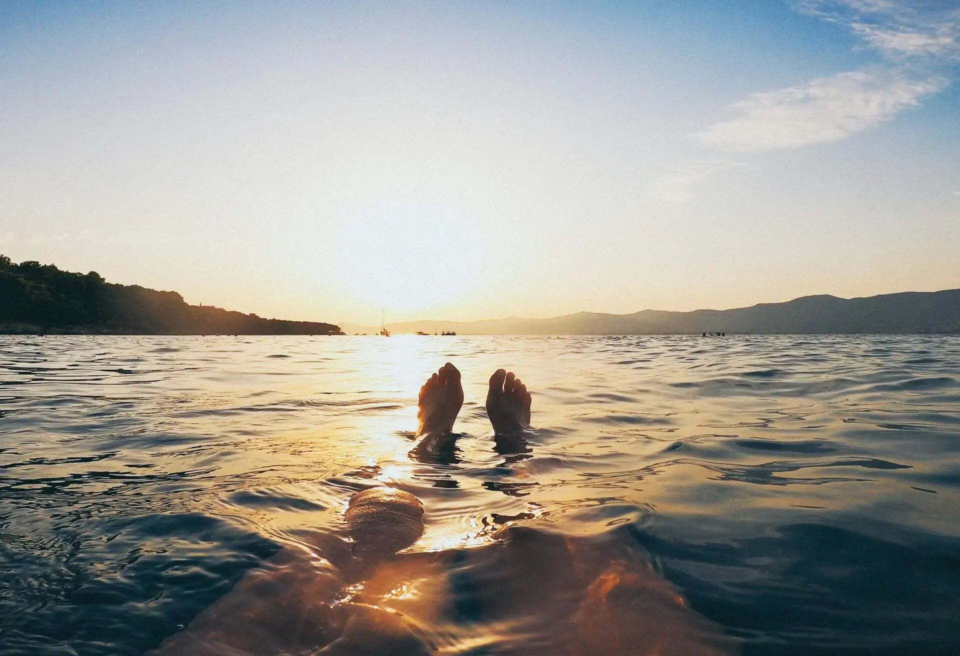 POV of beautiful sunset in the water in the Adriatic sea, Split Croatia