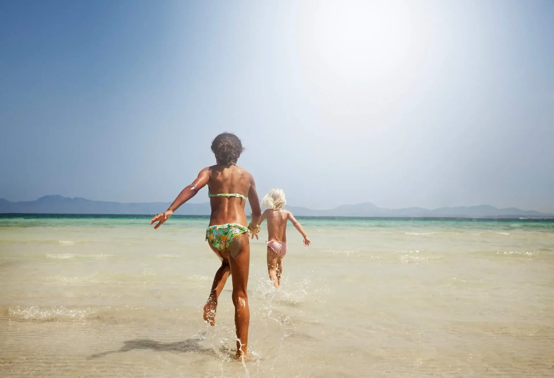 DEST_SPAIN_MALLORCA_THEME_BEACH_CHILDREN_GettyImages-1250608547