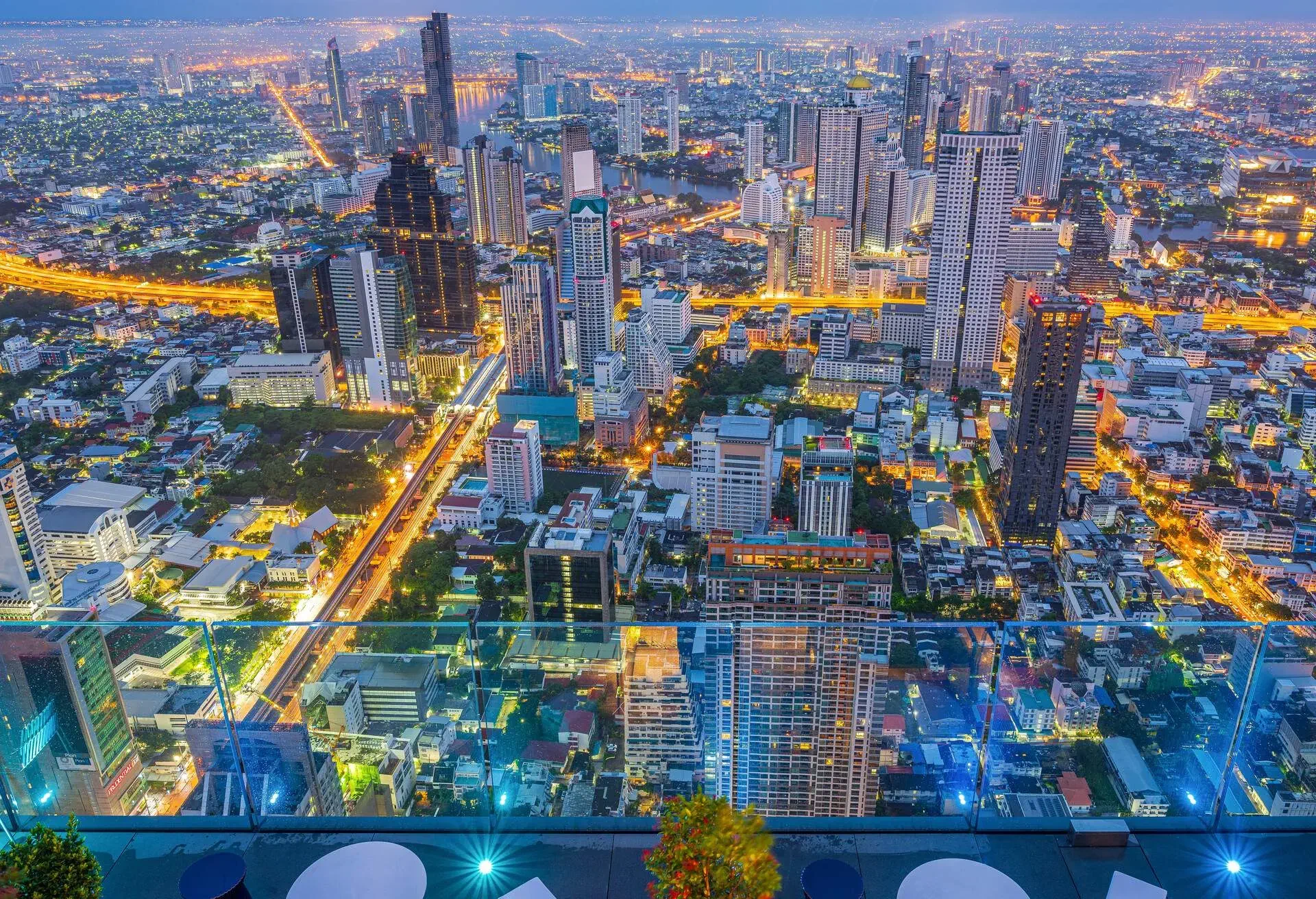 Bangkok center business district cityscape view point at Mahanakhon luxury rooftop bar skywalk is the new highest building in Bangkok, Thailand.